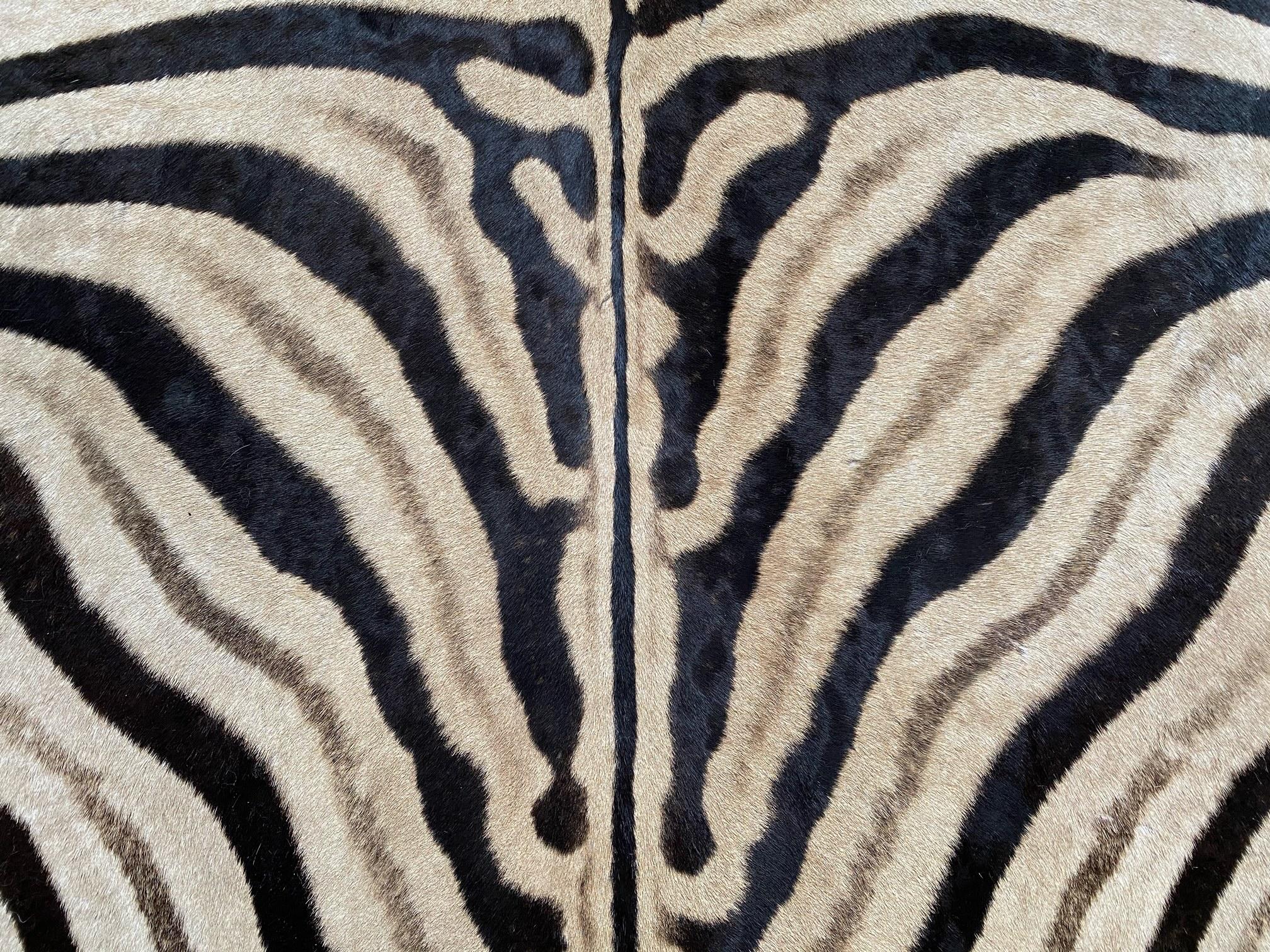 https://a.1stdibscdn.com/the-forsyth-ottoman-in-zebra-hide-for-sale-picture-5/f_17012/1593700712776/1290DE82_E60D_4B51_BF7B_8BF908164586_master.JPG