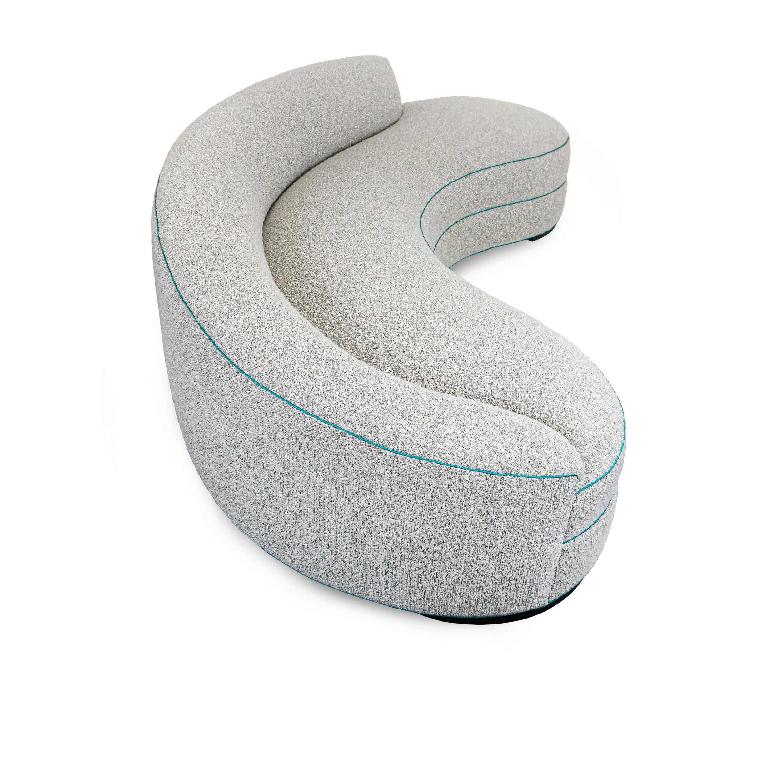 https://a.1stdibscdn.com/boucle-curved-sofa-with-turquoise-accents-for-sale-picture-8/f_21233/1622750903586/12_master.jpg