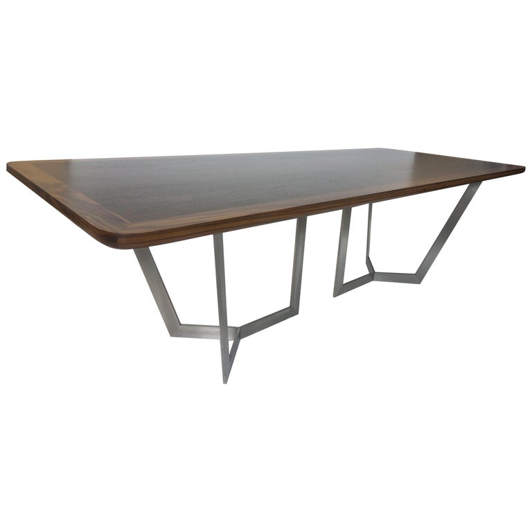 https://a.1stdibscdn.com/modern-dining-room-table-with-wooden-top-and-stainless-finished-legs-for-sale/1121189/f_130841211547190864199/13084121_master.jpg?width=768