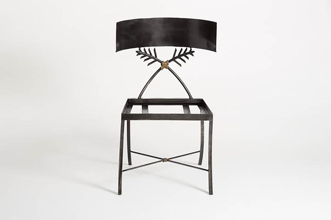 https://a.1stdibscdn.com/contemporary-iron-klismos-chair-for-sale-picture-2/f_8879/f_416127721727189933485/131009_1949_2_master.jpg