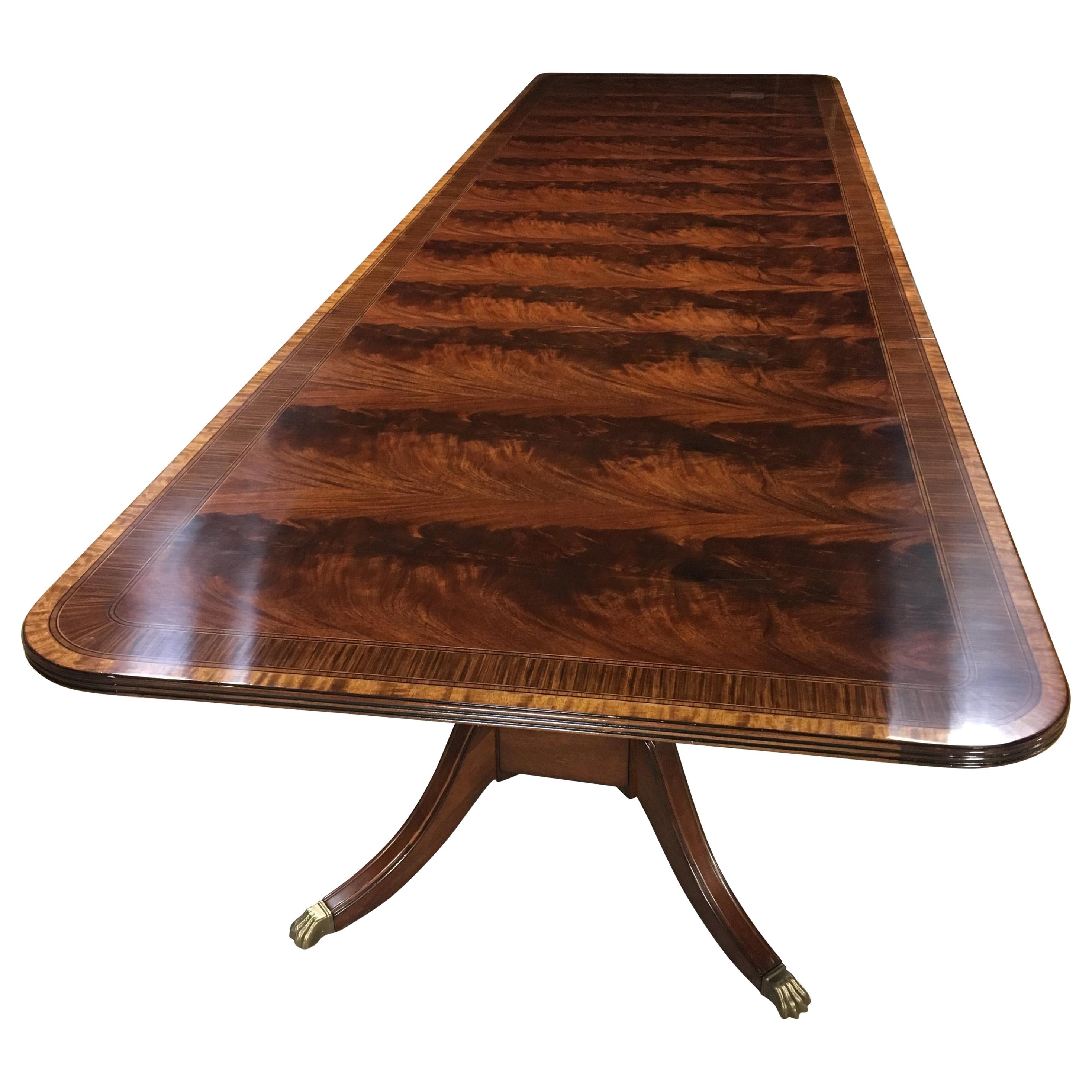 https://a.1stdibscdn.com/multi-banded-14-ft-mahogany-regency-style-dining-table-by-leighton-hall-for-sale/1121189/f_135370821551518926602/13537082_master.jpeg
