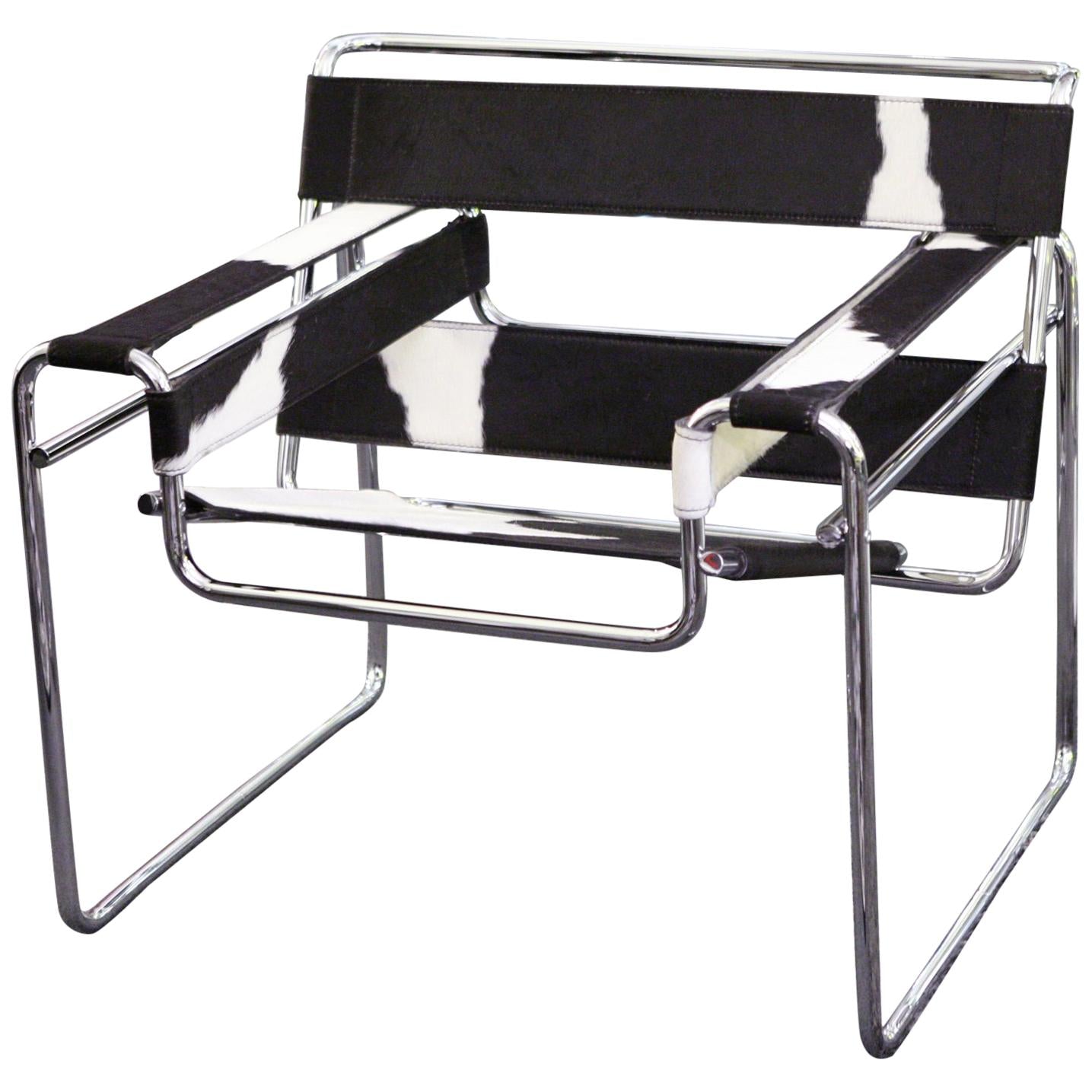 https://a.1stdibscdn.com/cowhide-2-armchair-for-sale/1121189/f_138367111551515689684/13836711_master.jpg