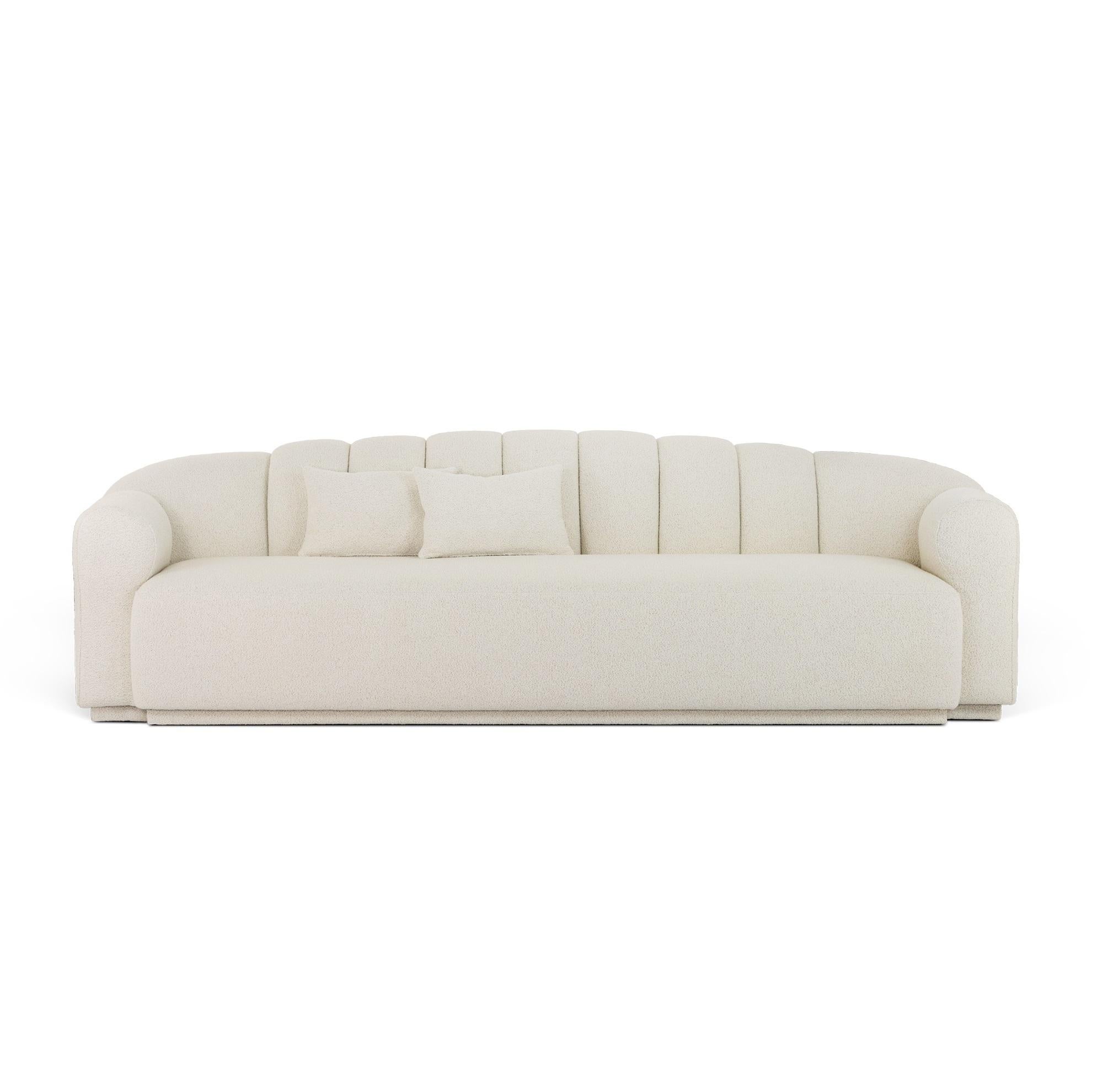 https://a.1stdibscdn.com/upholstered-sofa-with-channel-tufted-back-plinth-base-for-sale-picture-3/f_27693/f_463136021755517945112/13931468_02_master.jpg