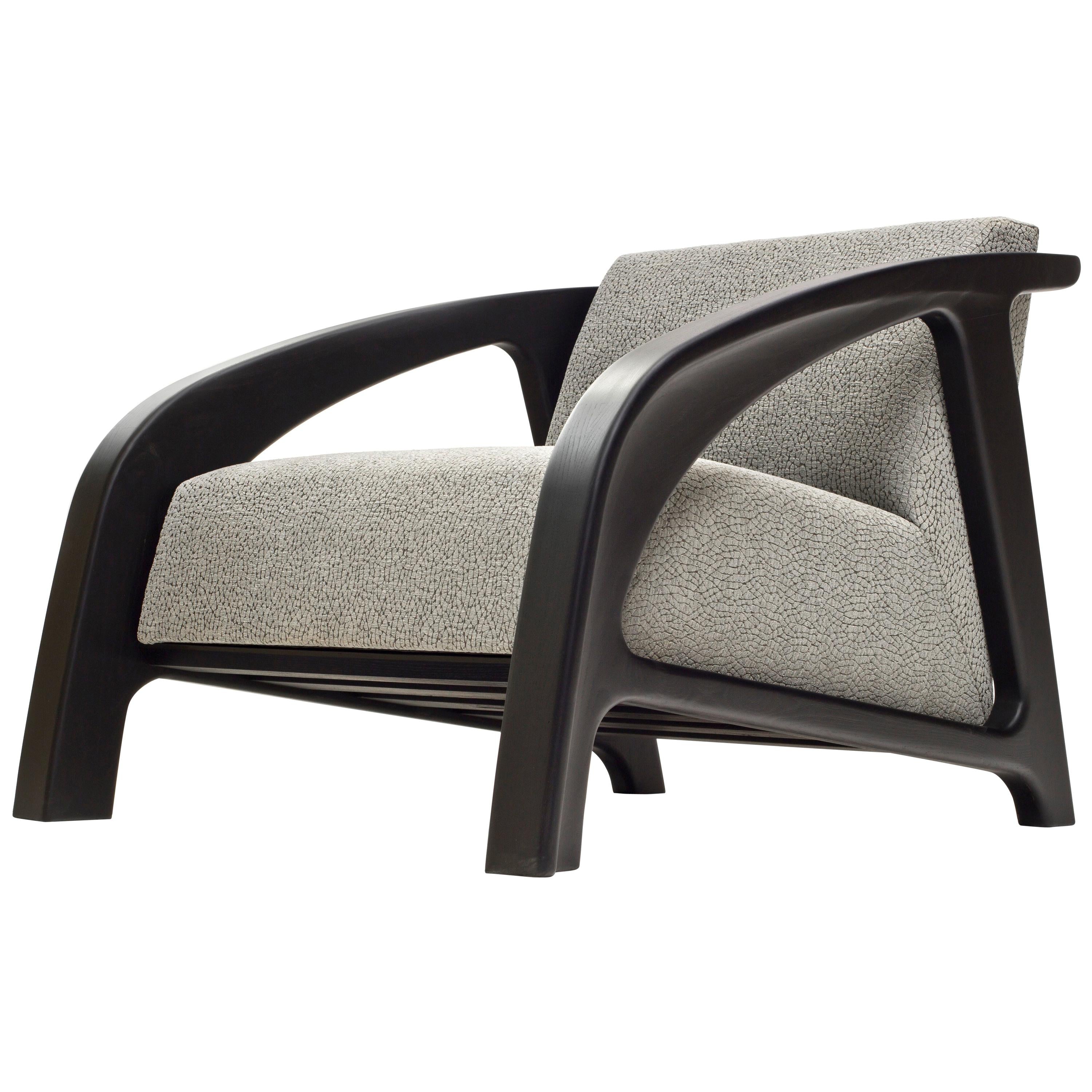 https://a.1stdibscdn.com/cambre-lounge-chair-in-ebonized-ash-with-grey-upholstered-cushion-by-wooda-for-sale/1121189/f_140283521552914342779/14028352_master.jpg