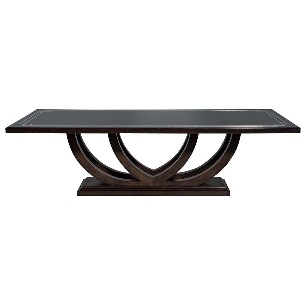 https://a.1stdibscdn.com/custom-walnut-dining-table-with-polished-metal-inlay-details-and-curved-base-for-sale/1121189/f_140896211553231327728/14089621_master.jpg