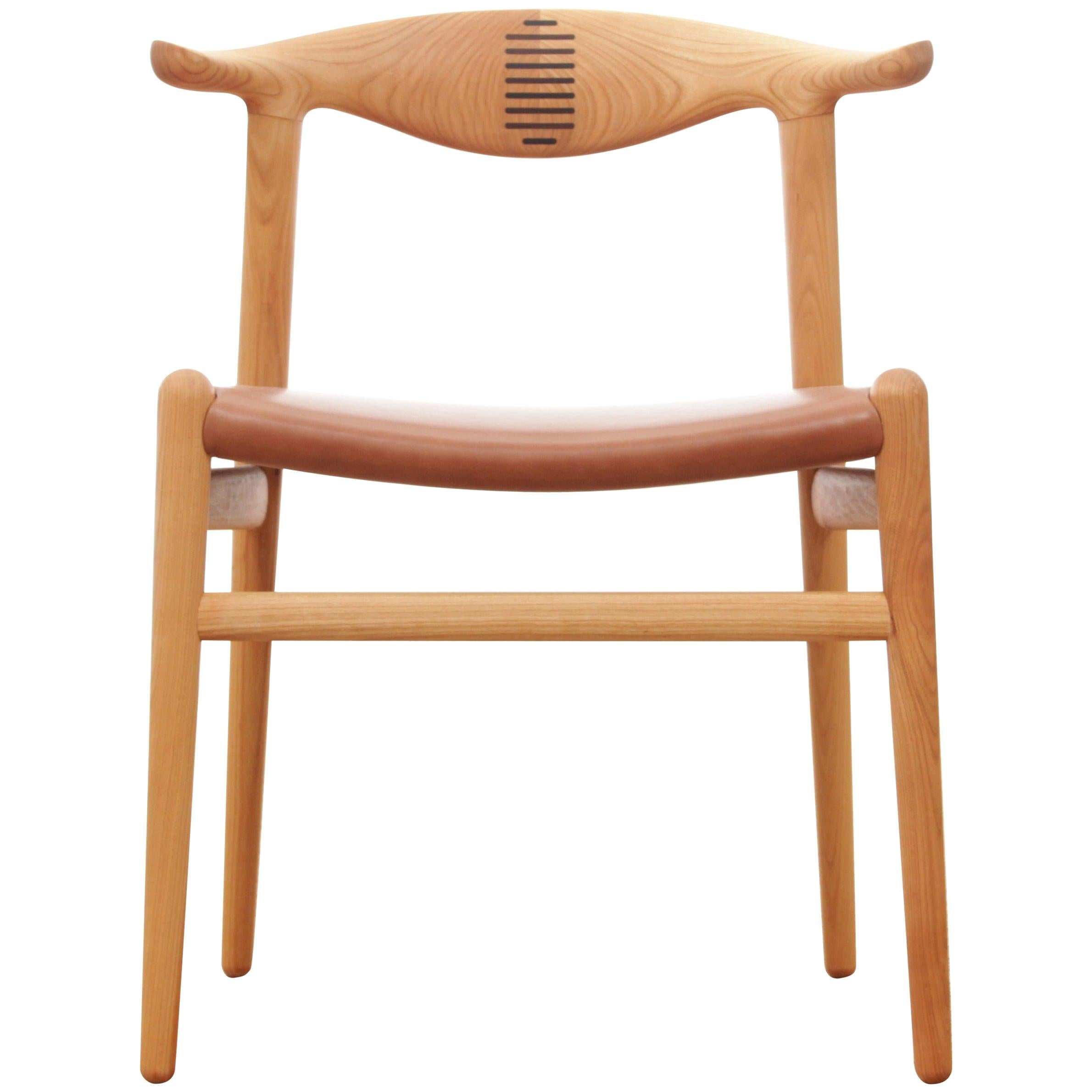 https://a.1stdibscdn.com/mid-century-modern-scandinavian-chair-model-cow-horn-pp-505-by-hans-wegner-new-for-sale/1121189/f_144138611569453387336/14413861_master.jpg