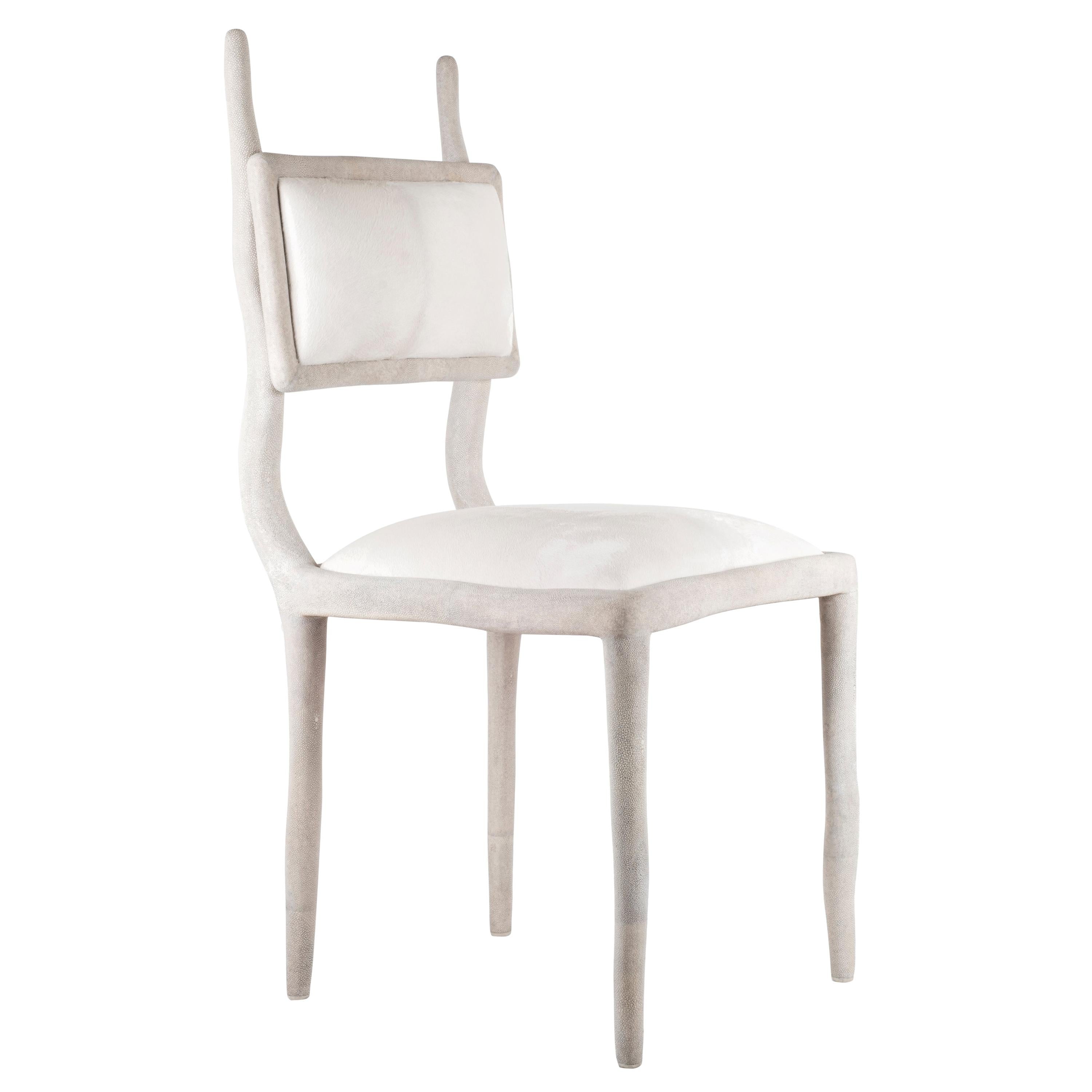 https://a.1stdibscdn.com/eden-chair-in-black-pen-shell-and-upholstered-in-calf-hair-by-ry-augousti-for-sale-picture-4/f_45491/f_153082411562032817022/14596071_master.jpg