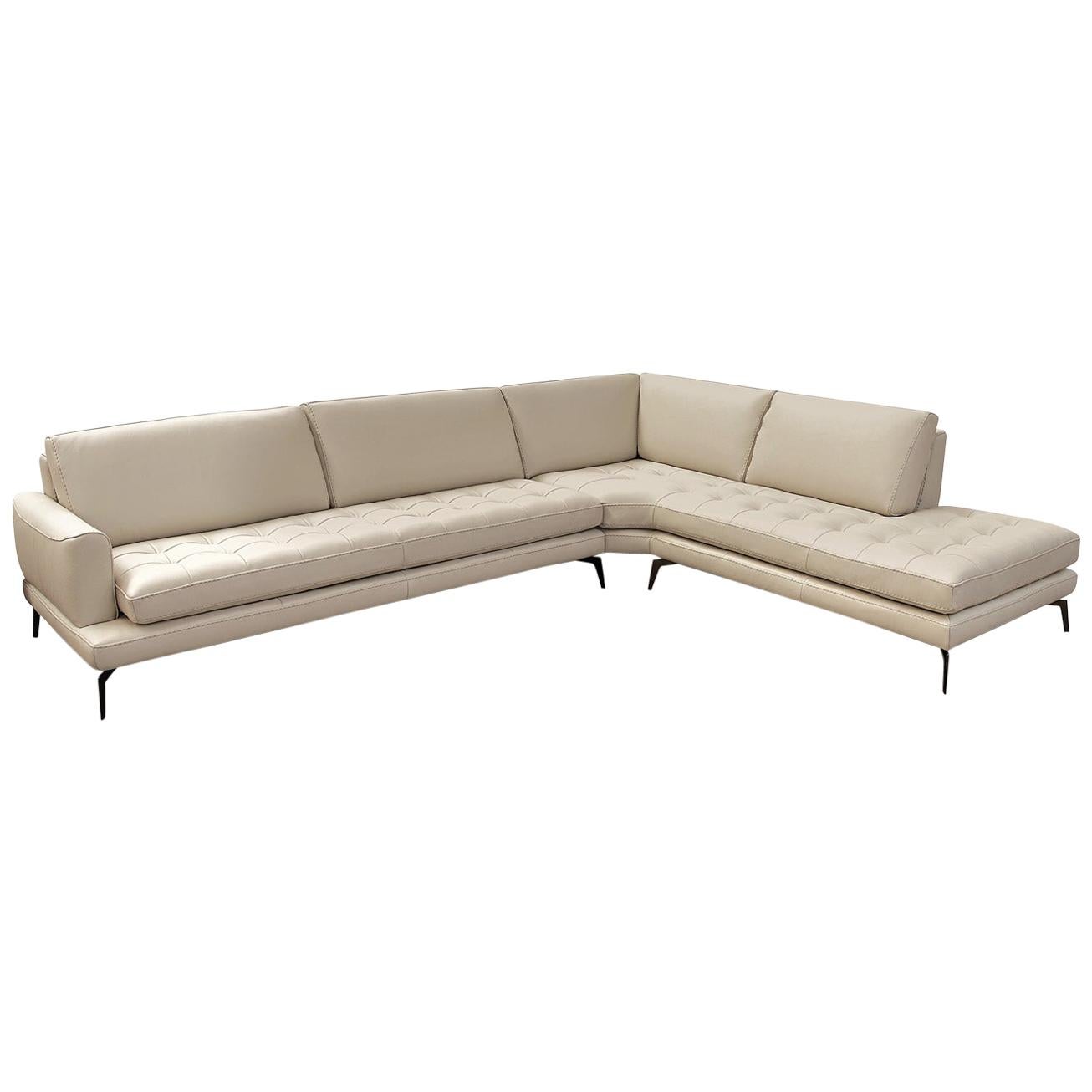 https://a.1stdibscdn.com/lifetime-leather-sectional-ivory-color-tufting-with-tone-on-tone-stitchings-for-sale/1121189/f_149609711559648267831/14960971_master.jpg
