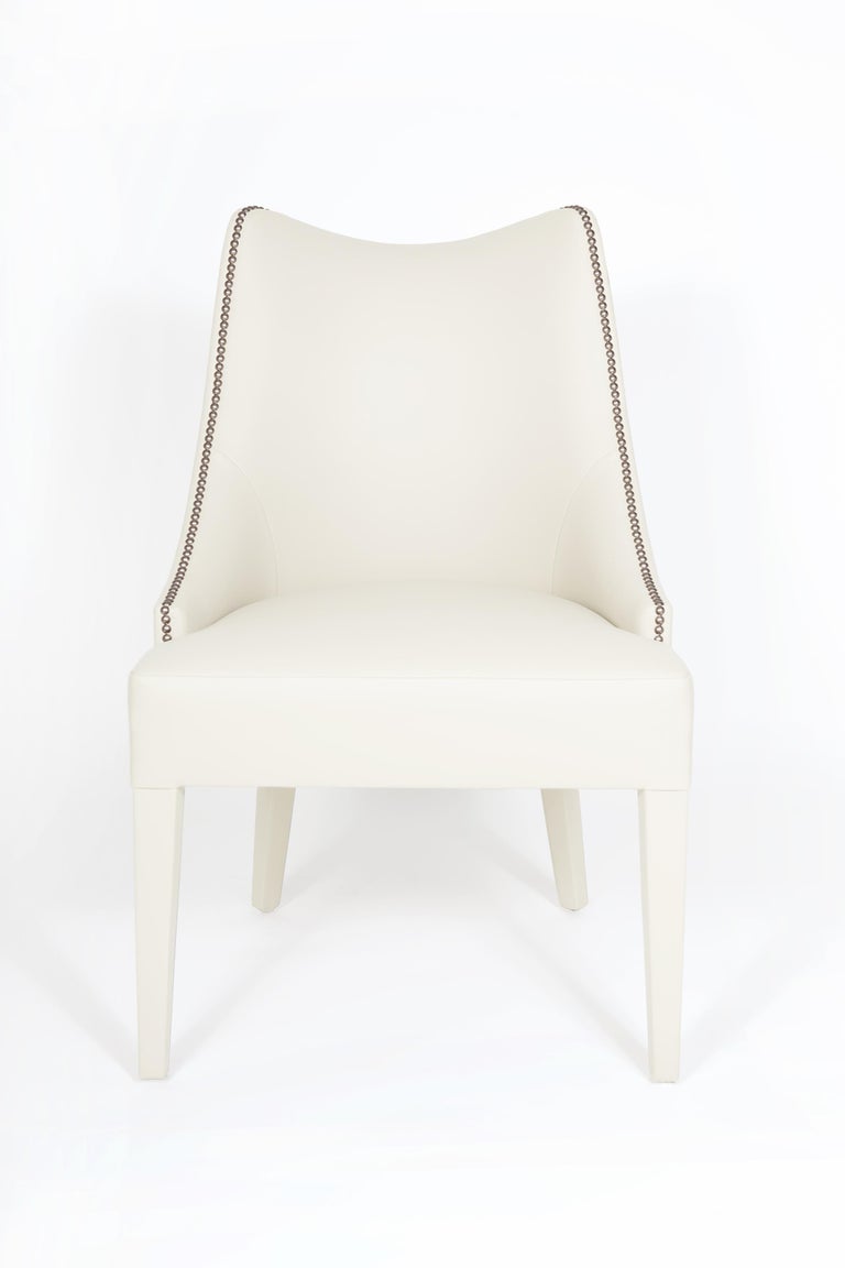 https://a.1stdibscdn.com/contemporary-velvet-dining-chair-offered-with-nails-on-the-curve-back-for-sale-picture-5/f_27693/f_330627721677745734584/151100_MUNNA_Becomes_Me_Dining_Chair_ORIGINAL_1__master.jpg?width=768