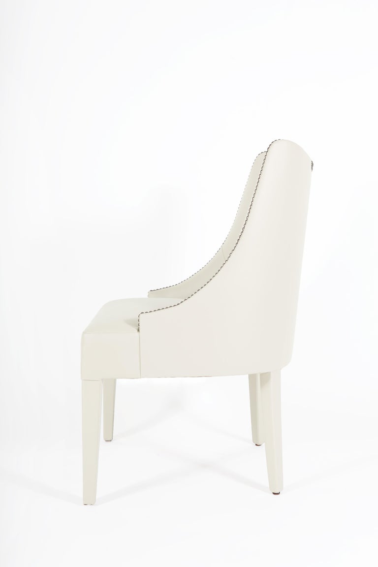 https://a.1stdibscdn.com/contemporary-velvet-dining-chair-offered-with-nails-on-the-curve-back-for-sale-picture-6/f_27693/f_330627721677745733043/151100_MUNNA_Becomes_Me_Dining_Chair_ORIGINAL_3__master.jpg?width=768