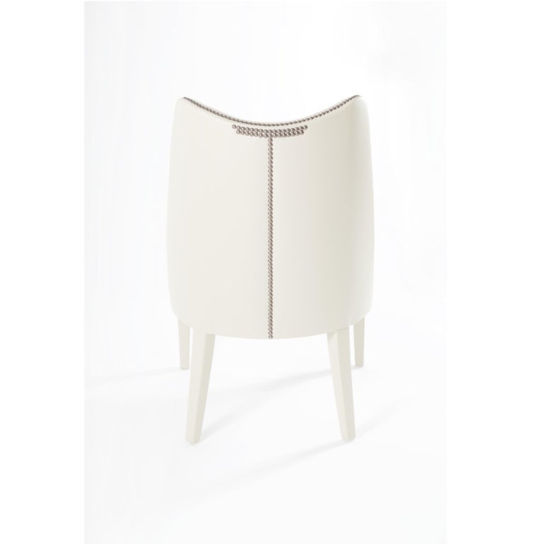 https://a.1stdibscdn.com/contemporary-velvet-dining-chair-offered-with-nails-on-the-curve-back-for-sale-picture-7/f_27693/f_330627721677745709348/151100_MUNNA_Becomes_Me_Dining_Chair_ORIGINAL_7__master.jpg?width=768