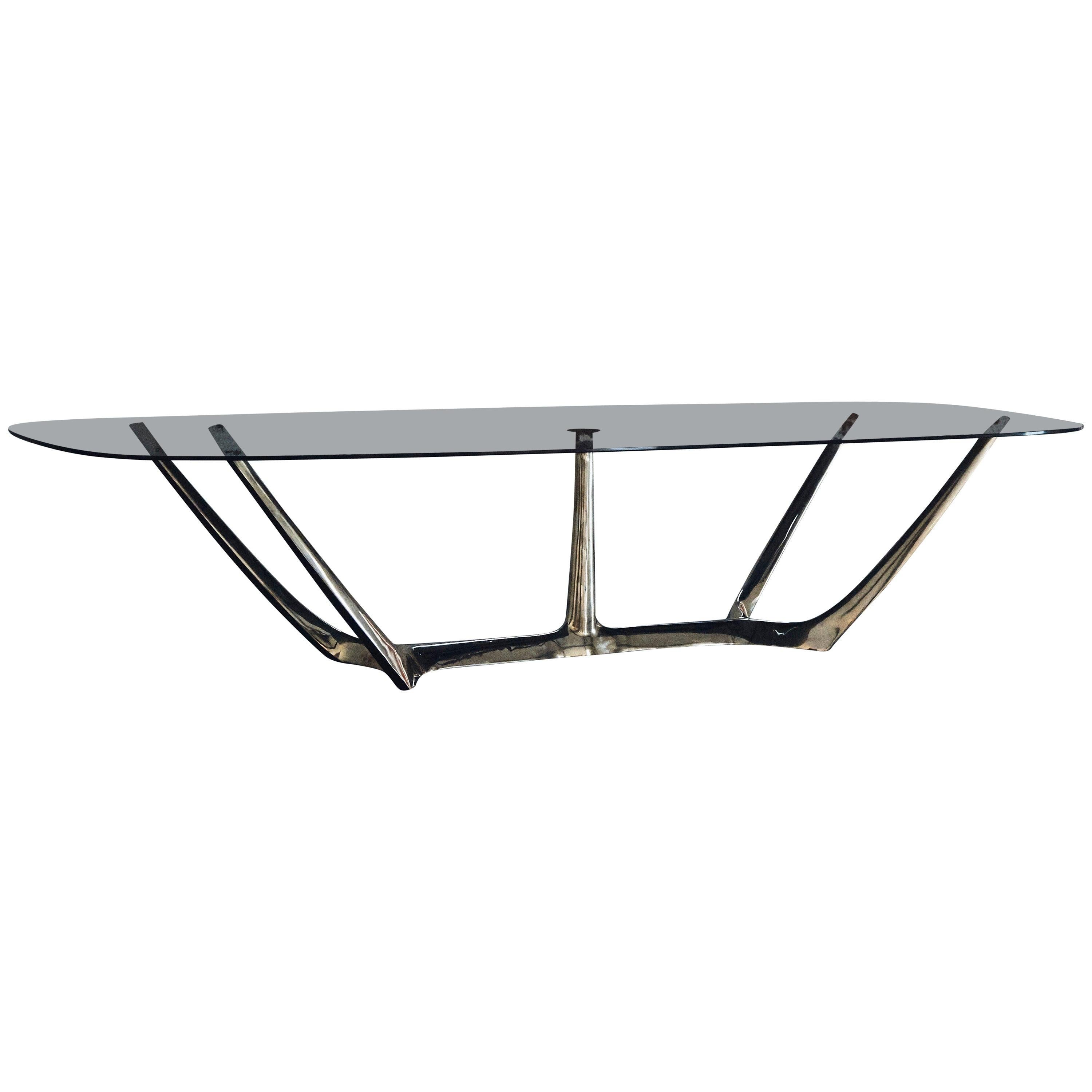 https://a.1stdibscdn.com/barbera-the-great-dining-table-modern-solid-bronze-base-with-grey-glass-top-for-sale/1121189/f_151482421604288520871/15148242_org_master.jpg