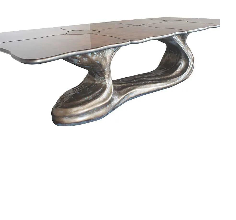 https://a.1stdibscdn.com/hand-sculpted-oval-dining-table-for-indoor-and-outdoor-use-for-sale-picture-9/f_27693/f_485274721769502873532/154001_10955226_master.jpg
