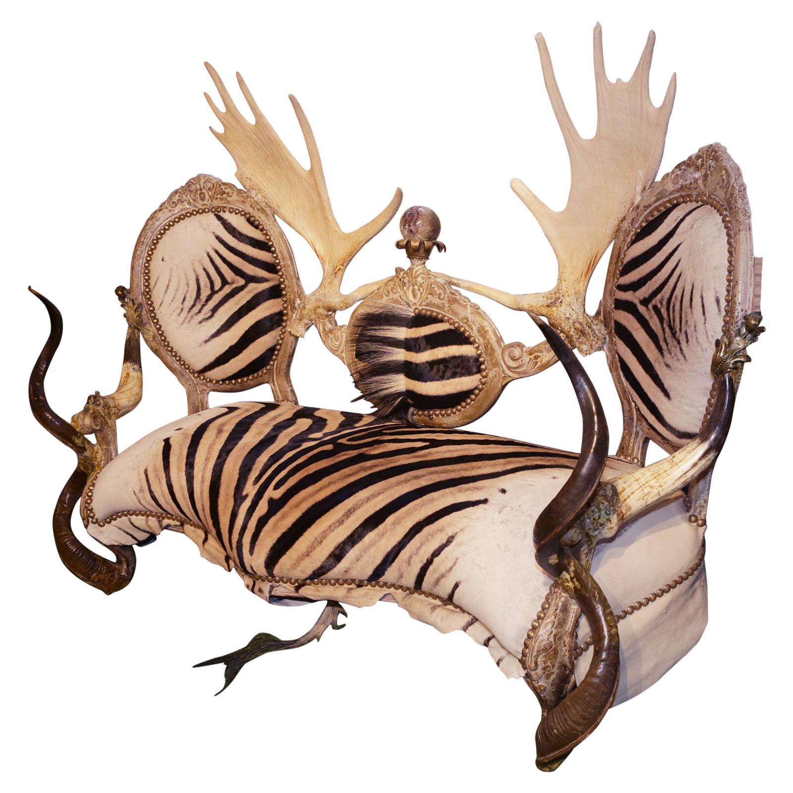 https://a.1stdibscdn.com/zebra-with-medaillons-sofa-for-sale/1121189/f_155966621564210856196/15596662_master.jpg