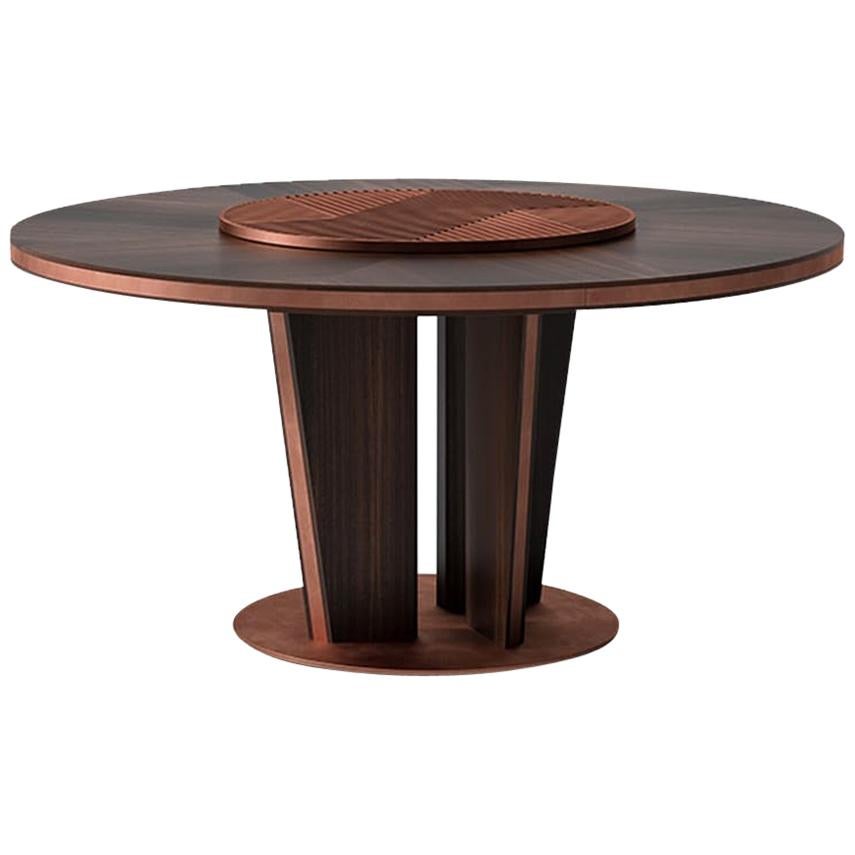 https://a.1stdibscdn.com/sesto-senso-round-dining-table-with-lazy-susan-for-sale/1121189/f_157542021565360627597/15754202_master.jpg