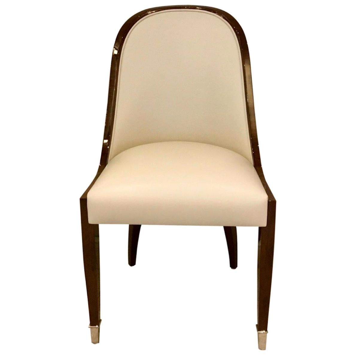 https://a.1stdibscdn.com/chair-with-wide-curved-backrest-in-art-deco-style-with-leather-and-wood-for-sale/1121189/f_159363121566977094108/15936312_master.jpeg