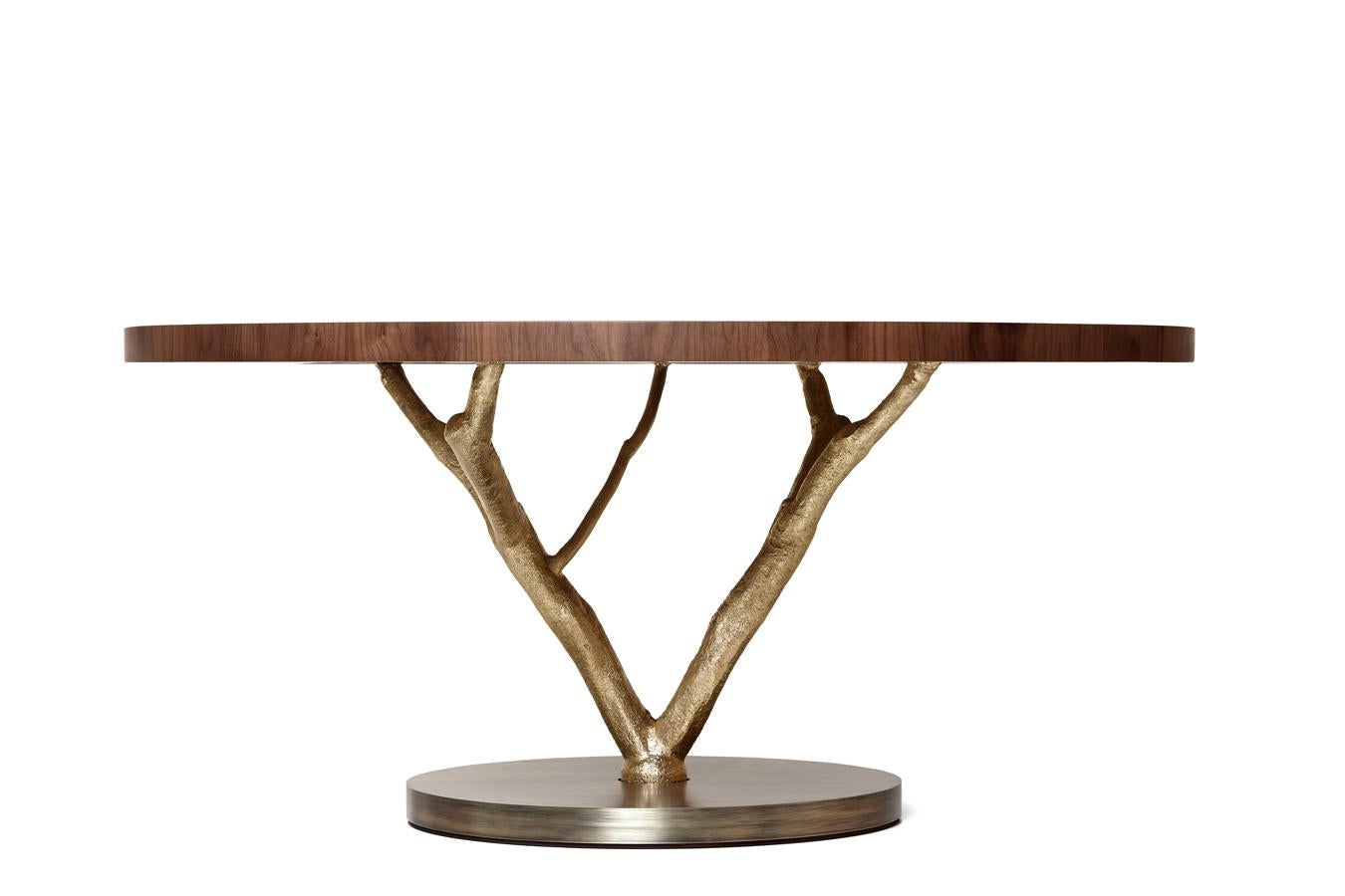 https://a.1stdibscdn.com/customizable-round-dining-table-with-cast-brass-structure-wooden-top-for-sale-picture-10/f_27693/f_337669321681294778891/160122_GJ_PRIMITIVE_ROUND_DINING_TABLE_01_master.jpg