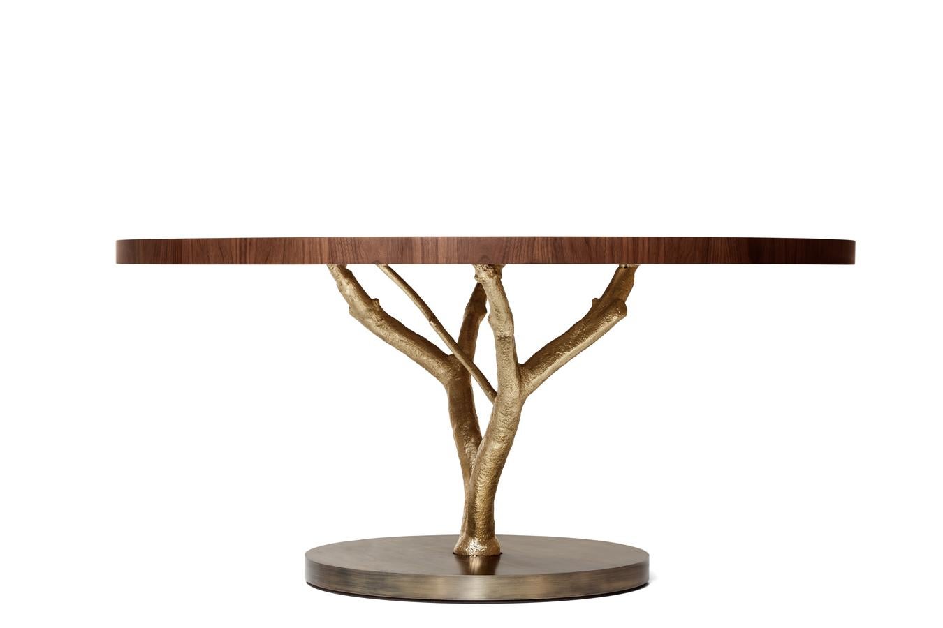 https://a.1stdibscdn.com/customizable-round-dining-table-with-cast-brass-structure-wooden-top-for-sale-picture-3/f_27693/f_337669321681294776802/160122_GJ_PRIMITIVE_ROUND_DINING_TABLE_05_master.jpg
