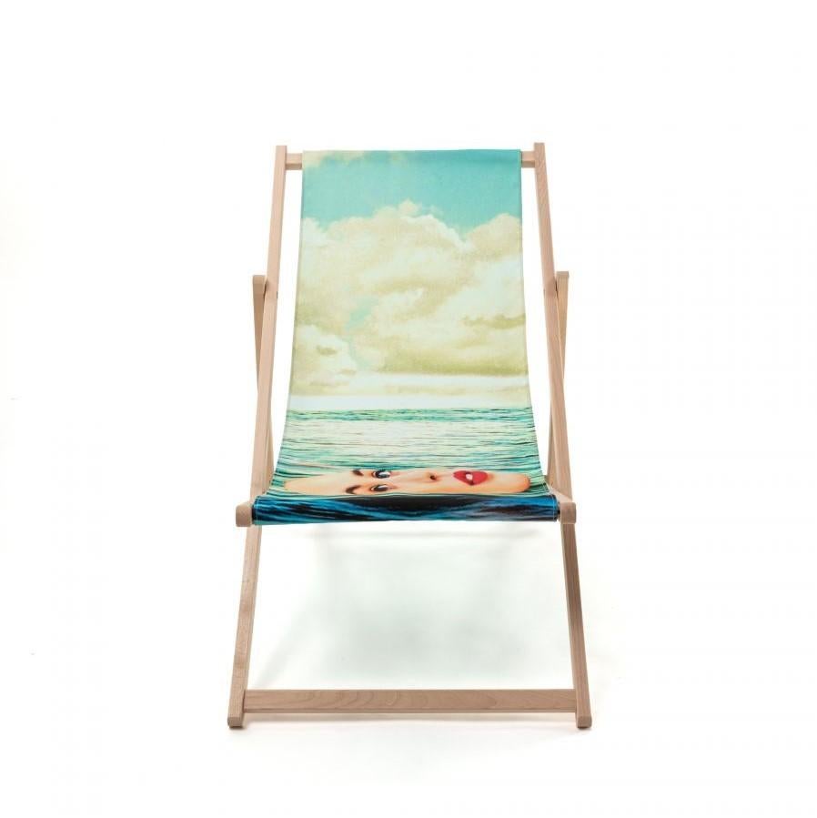https://a.1stdibscdn.com/deck-chair-for-sale-picture-4/f_8922/f_300462821660845144194/16682_toiletpaper_deckchiar_girlinthesea_2_master.jpg