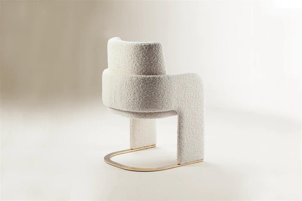 https://a.1stdibscdn.com/dooq-dining-chair-odisseia-with-off-white-boucle-and-brass-for-sale-picture-3/f_54242/f_350726321688467757237/1677520213580_311_master.jpg