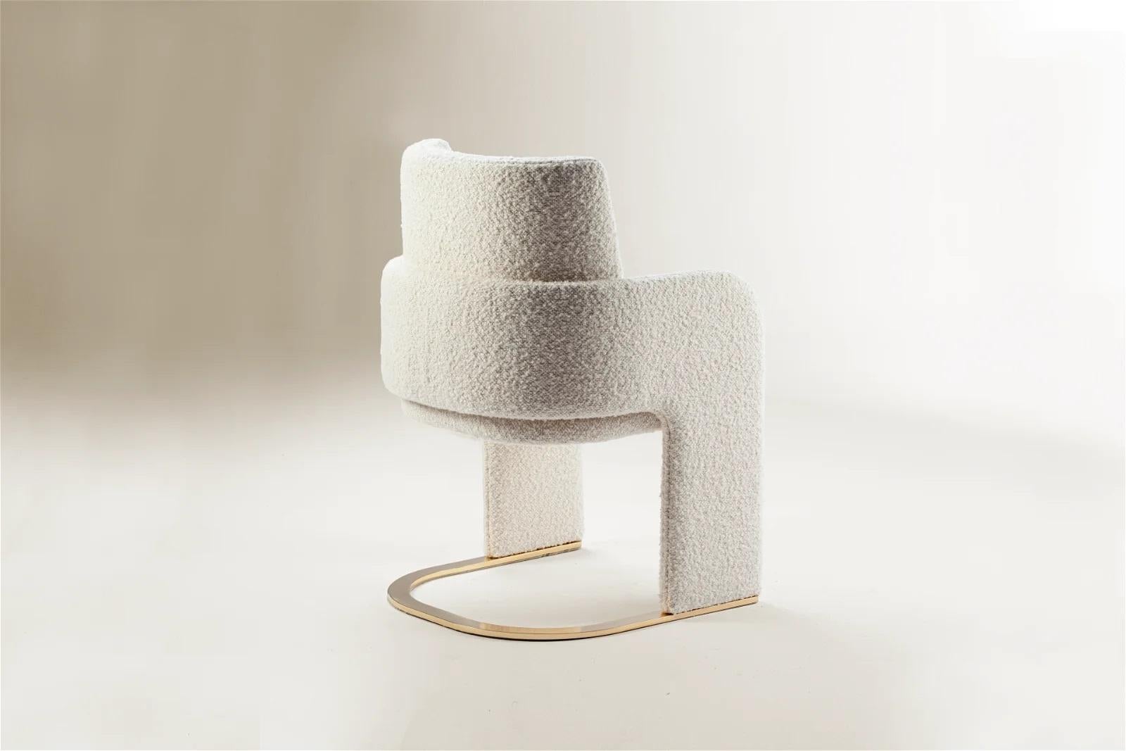 https://a.1stdibscdn.com/dooq-dining-chair-odisseia-with-off-white-boucle-and-brass-for-sale-picture-3/f_54242/f_350726321688467757237/1677520213580_311_master.jpg