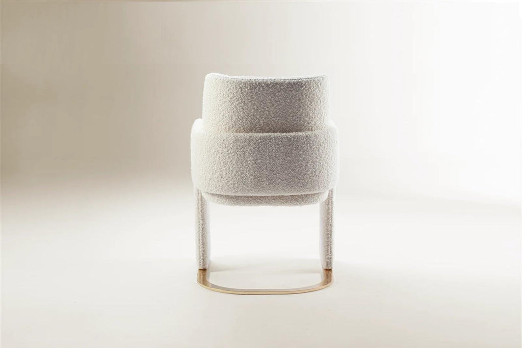 https://a.1stdibscdn.com/dooq-dining-chair-odisseia-with-off-white-boucle-and-brass-for-sale-picture-4/f_54242/f_350726321688467757834/1677520213580_312_master.jpg