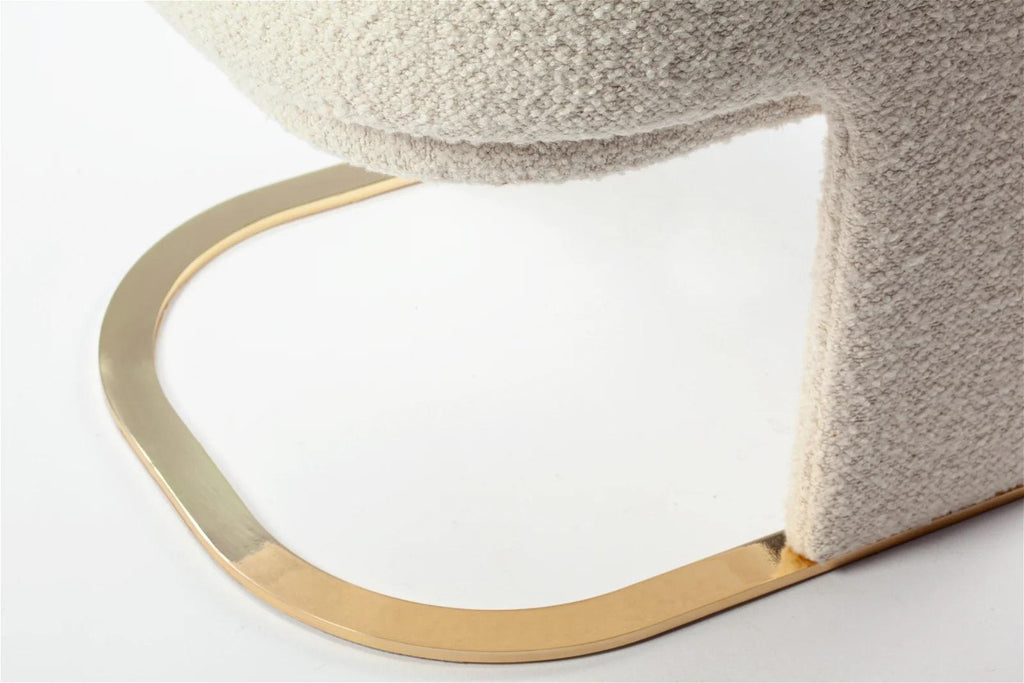 https://a.1stdibscdn.com/dooq-dining-chair-odisseia-with-off-white-boucle-and-brass-for-sale-picture-5/f_54242/f_350726321688467758532/1677520213580_313_master.jpg