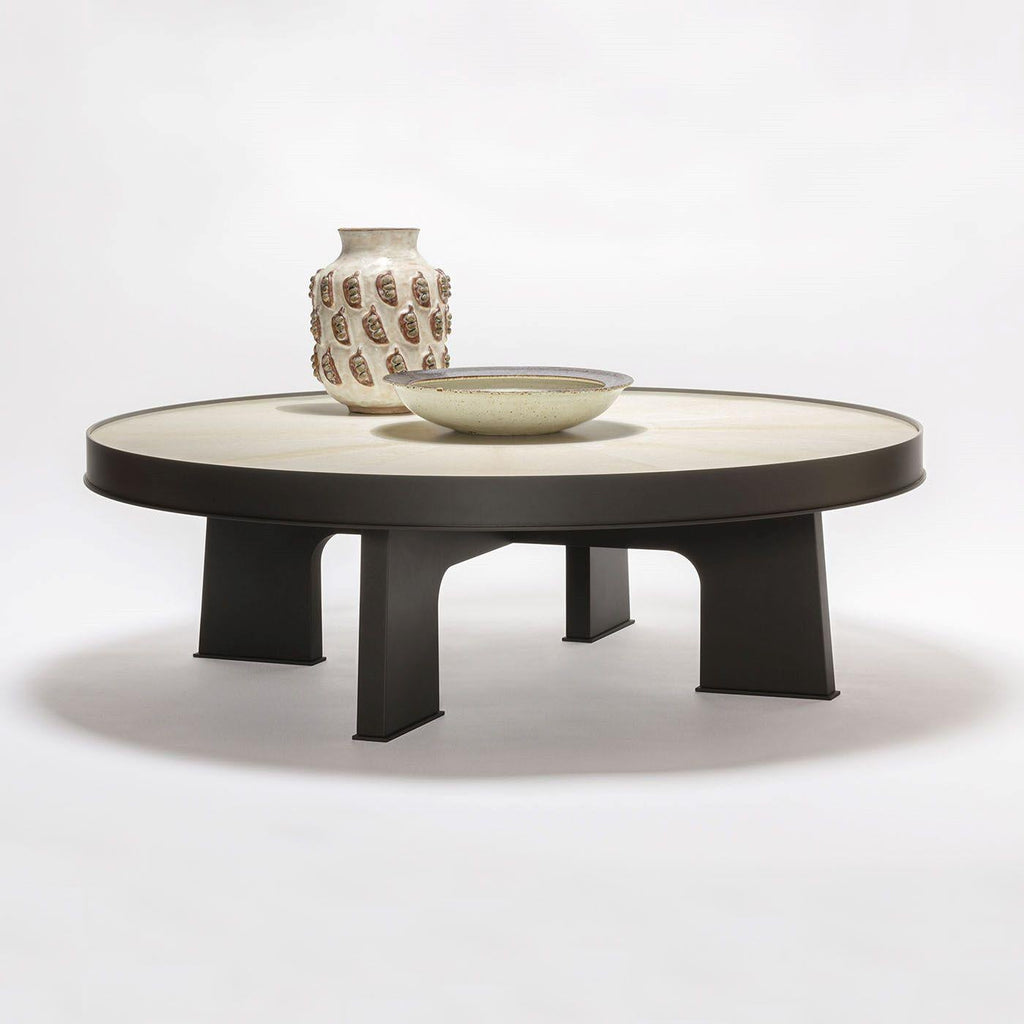 https://a.1stdibscdn.com/attica-round-parchment-coffee-table-for-sale-picture-2/f_17062/f_344652821685093712833/1683706164984_TAATNY_0002_MTP072_Attica_round_coffee_table_LACQUERED_BRONZE_LIFESTILE01_master.jpg