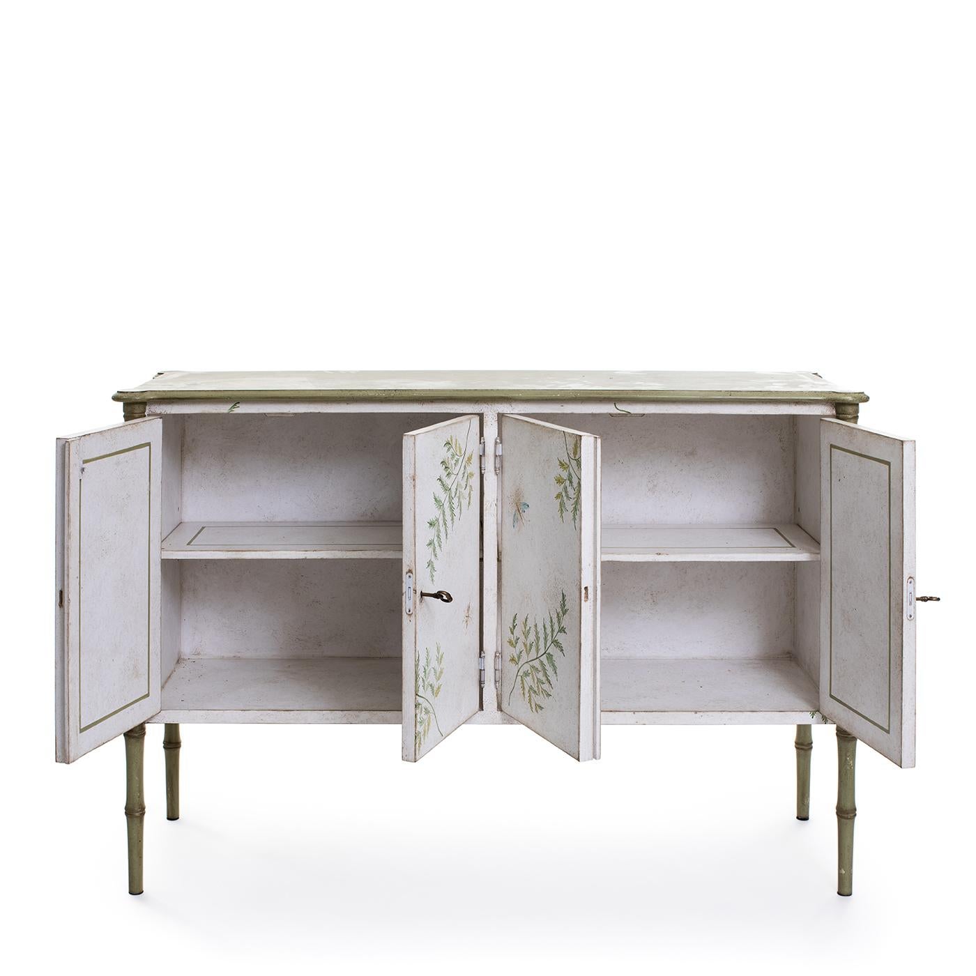 https://a.1stdibscdn.com/white-green-lombardia-bamboo-cabinet-with-ferns-and-butterflies-for-sale-picture-3/f_17062/f_351802721689090097543/1688391851282_ASTMNY_0054_Large_20Lombardia_20Bamboo_20Cabinet_20_284_29_master.jpg