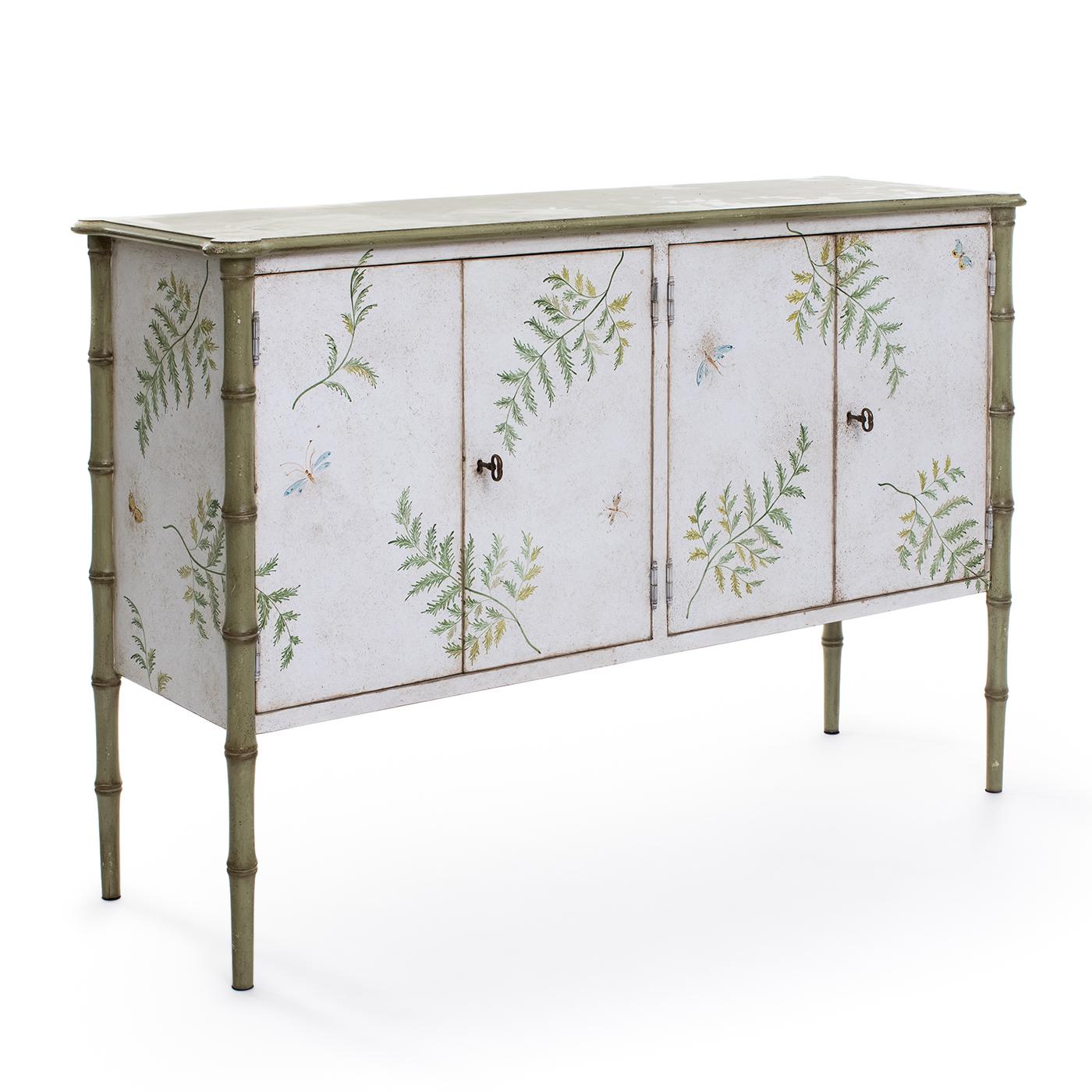 https://a.1stdibscdn.com/white-green-lombardia-bamboo-cabinet-with-ferns-and-butterflies-for-sale-picture-2/f_17062/f_351802721689090097530/1688391854926_ASTMNY_0056_Large_20Lombardia_20Bamboo_20Cabinet_20_281_29_master.jpg