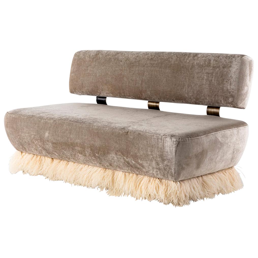 https://a.1stdibscdn.com/velvet-bronzed-steel-brass-and-ostrich-feather-ostrich-fluff-sofa-for-sale/1121189/f_169834121574508422289/16983412_master.jpg