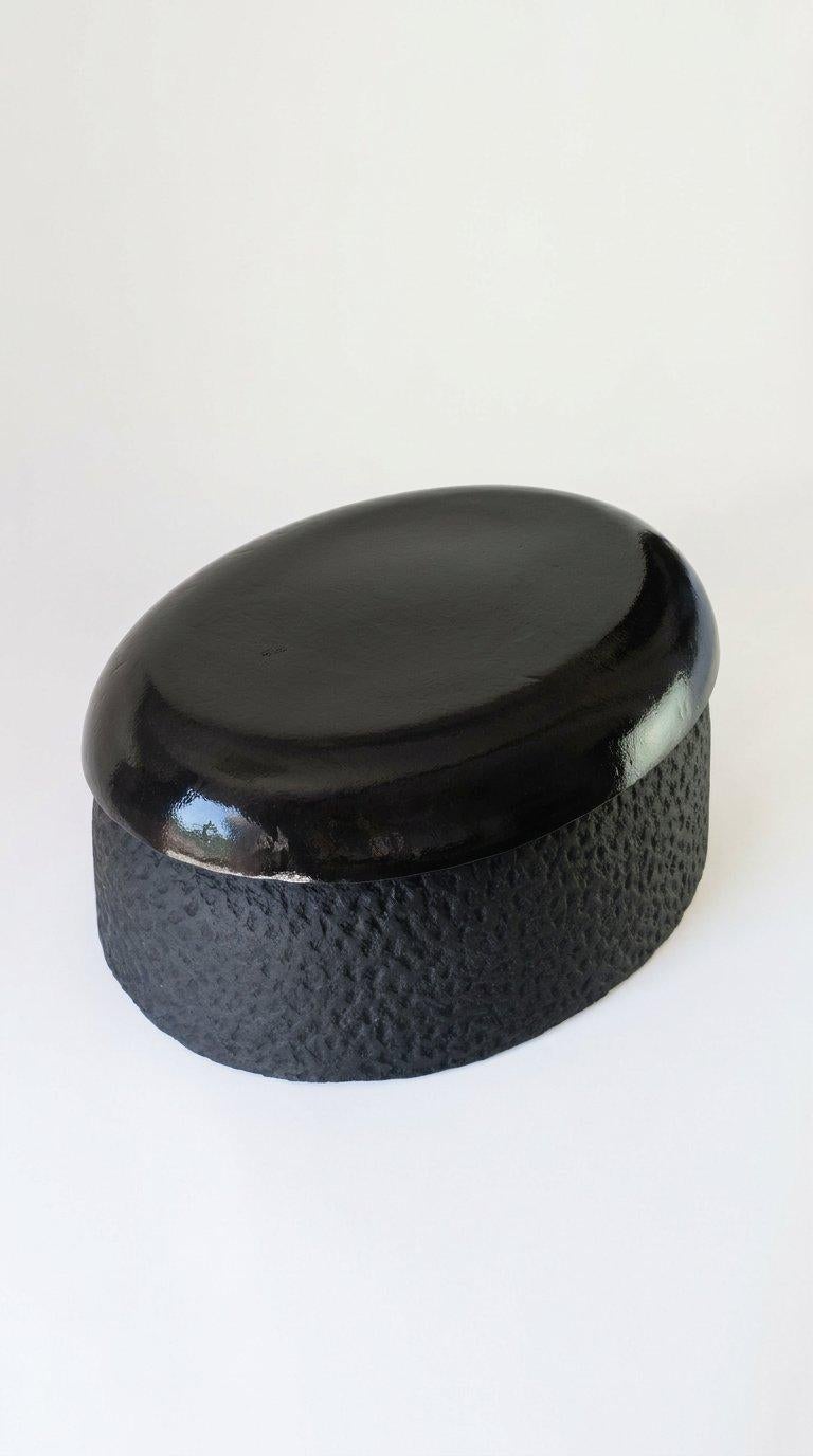 https://a.1stdibscdn.com/handcrafted-oval-black-cast-stone-coffee-table-by-alentes-atelier-greece-for-sale-picture-6/f_56452/f_495613821775577211199/16x9_STRAWBERRY_TABLE_AI_5__master.jpeg