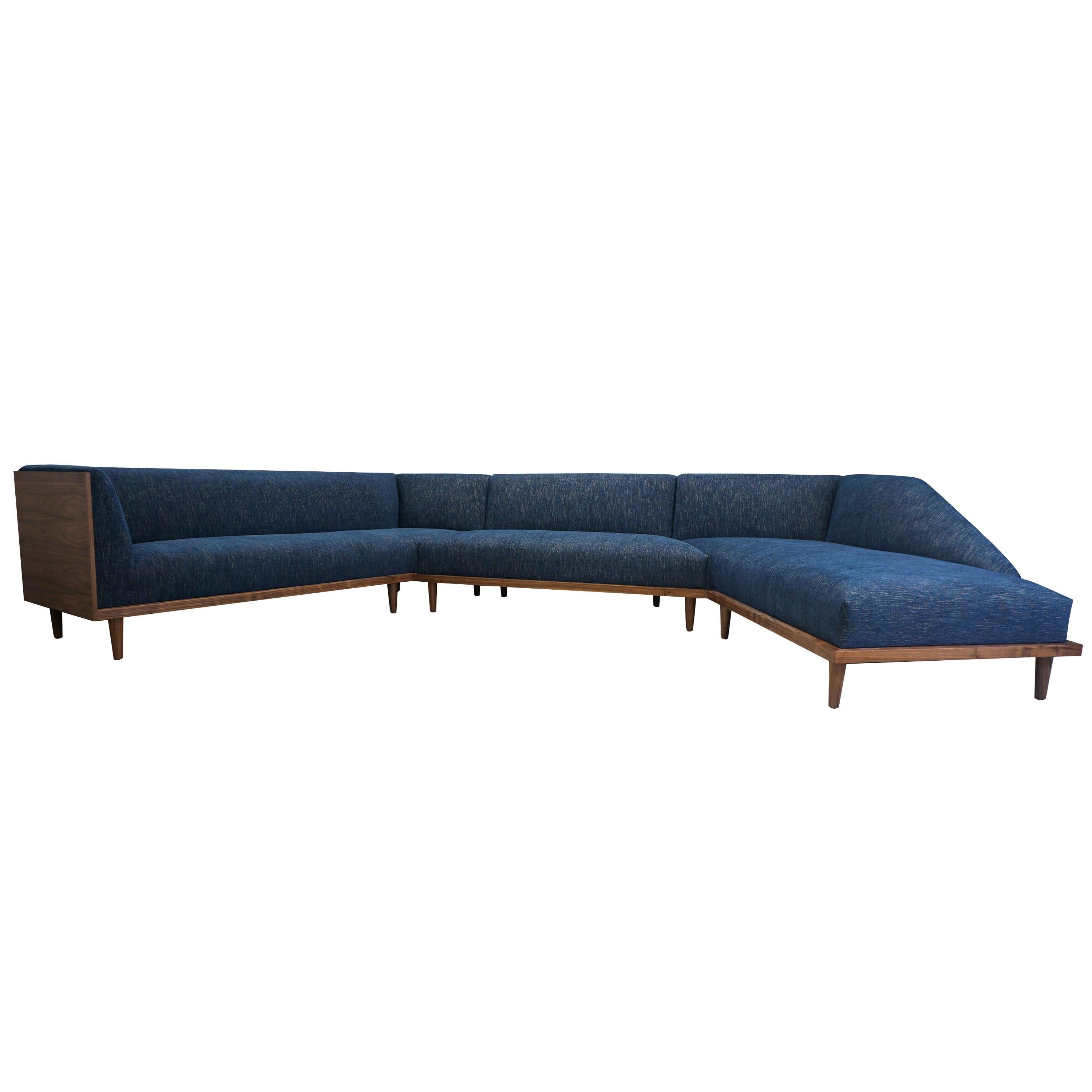 https://a.1stdibscdn.com/large-mid-century-modern-sectional-with-chaise-for-sale/1121189/f_171413521575710811703/17141352_master.jpg
