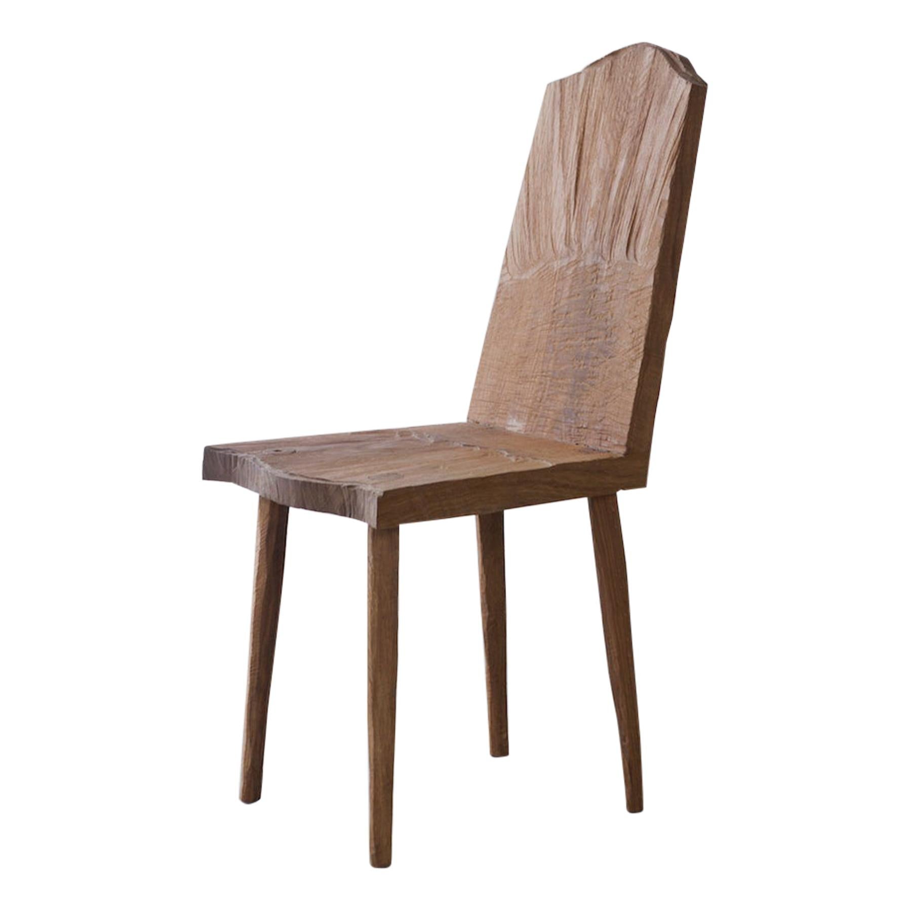 https://a.1stdibscdn.com/sculpted-chair-n1-in-solid-oak-wood-for-sale/f_31233/f_296306021658160572202/17258631_master.jpg