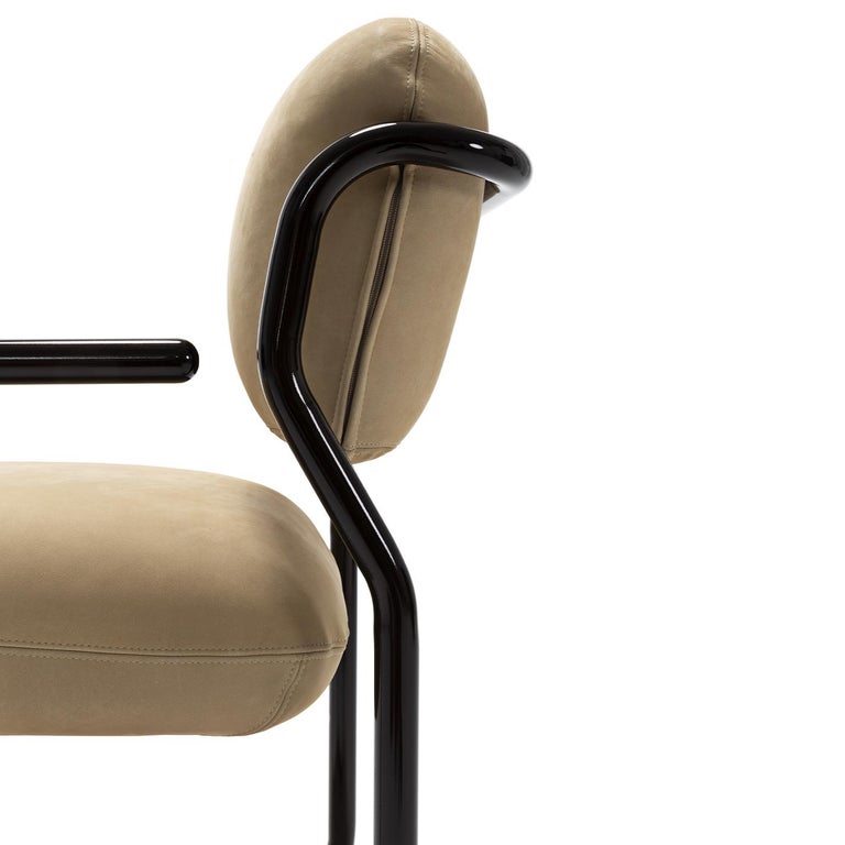 https://a.1stdibscdn.com/modernista-beige-leather-chair-studiopepe-by-exteta-for-sale-picture-4/f_17062/f_473571421762180870051/1751881924735_RMMMNY_0025_ModernistaChairDett2_master.jpg?width=768