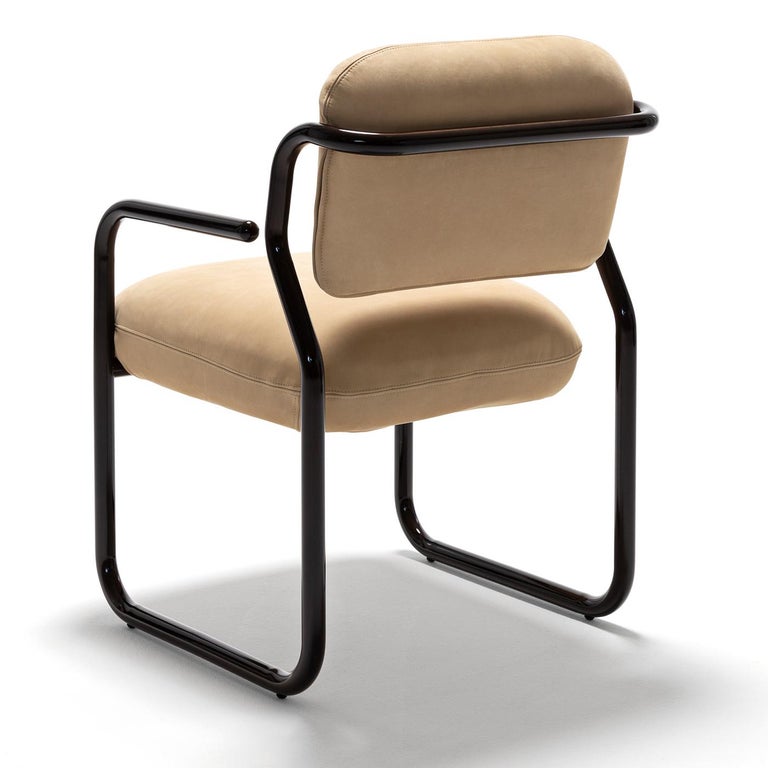 https://a.1stdibscdn.com/modernista-beige-leather-chair-studiopepe-by-exteta-for-sale-picture-9/f_17062/f_473571421762180899710/1751881924761_RMMMNY_0027_ModernistaChair3qtiBack_master.jpg?width=768