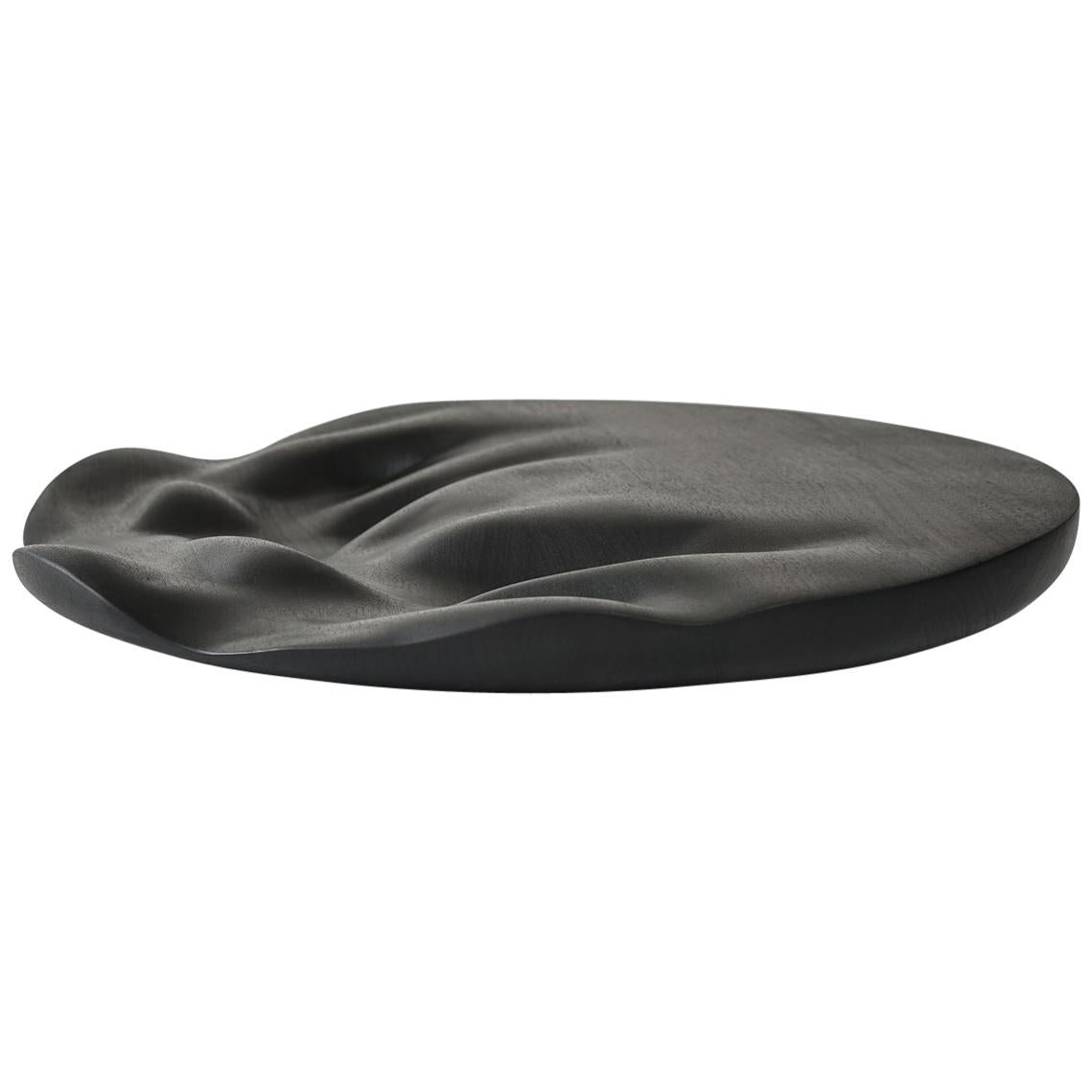 https://a.1stdibscdn.com/large-flow-round-contemporary-carved-walnut-ebonized-tray-board-for-sale/1121189/f_175193711578645739927/17519371_master.jpg