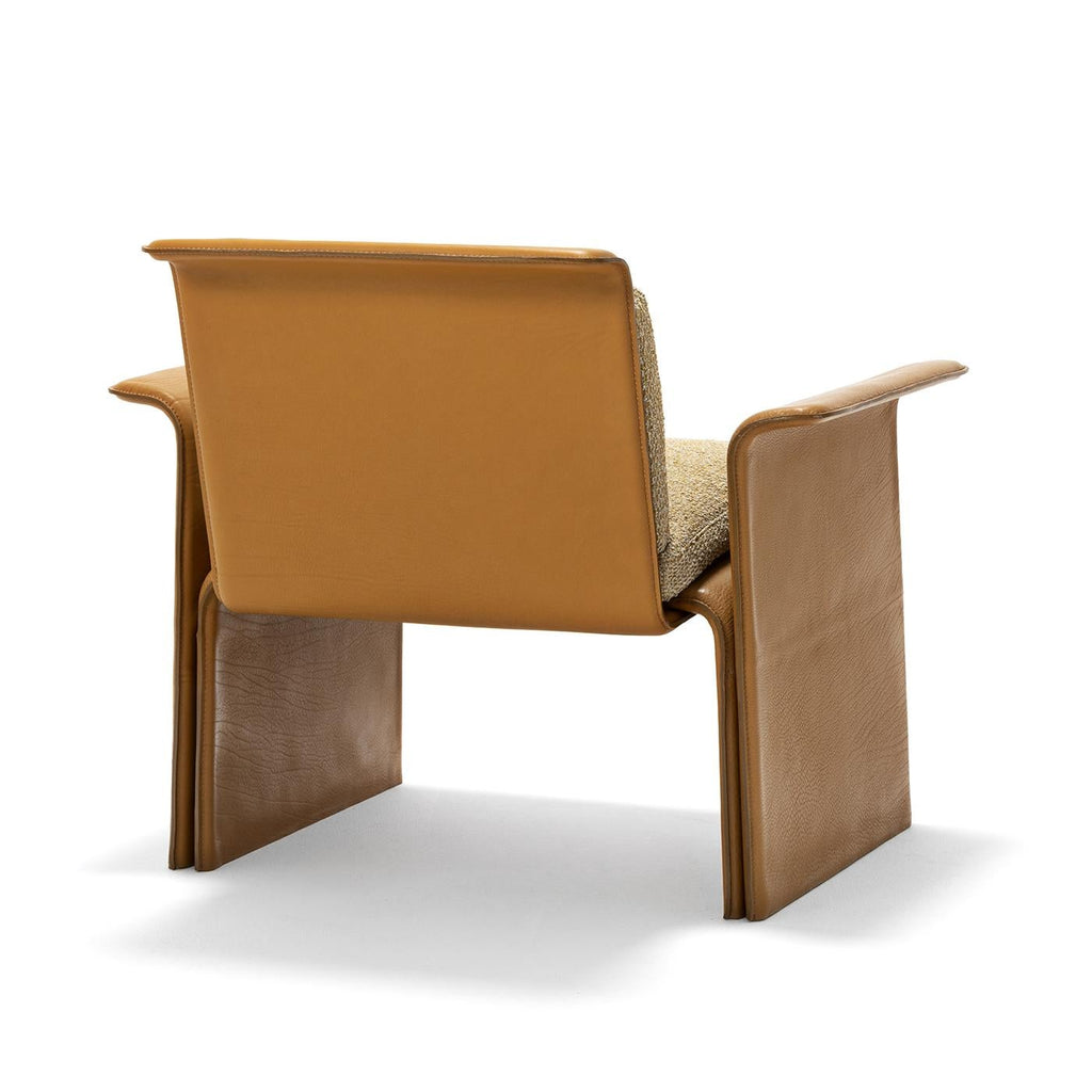 https://a.1stdibscdn.com/shell-brown-leather-armchair-studiopepe-by-exteta-for-sale-picture-5/f_17062/f_473136221761926374014/1759919417876_RMMMNY_SITE_0001_ShellArmchairTeak3qtiBack_master.jpg