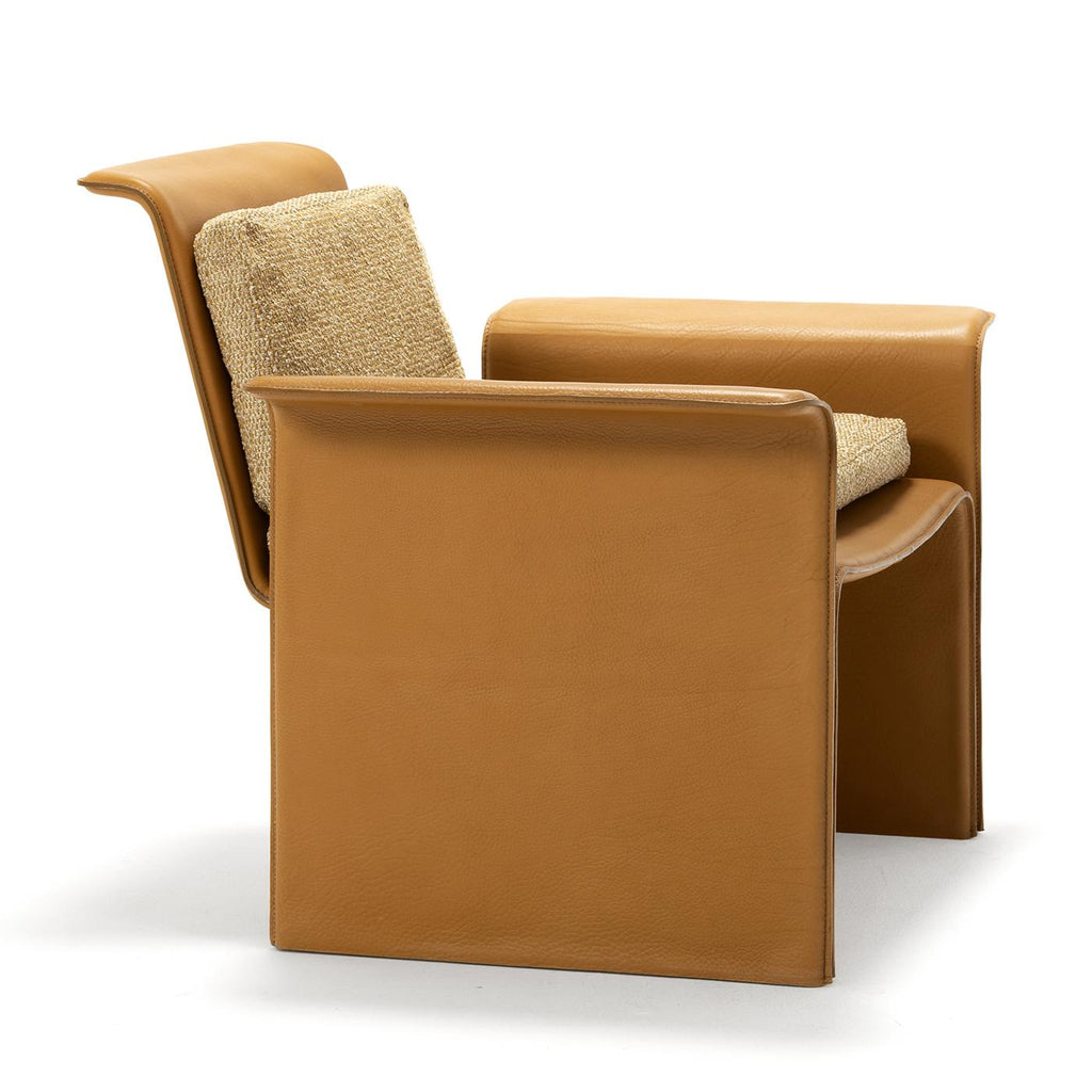 https://a.1stdibscdn.com/shell-brown-leather-armchair-studiopepe-by-exteta-for-sale-picture-4/f_17062/f_473136221761926374128/1759919418863_RMMMNY_SITE_0000_ShellArmchairTeak3qtiFront_master.jpg