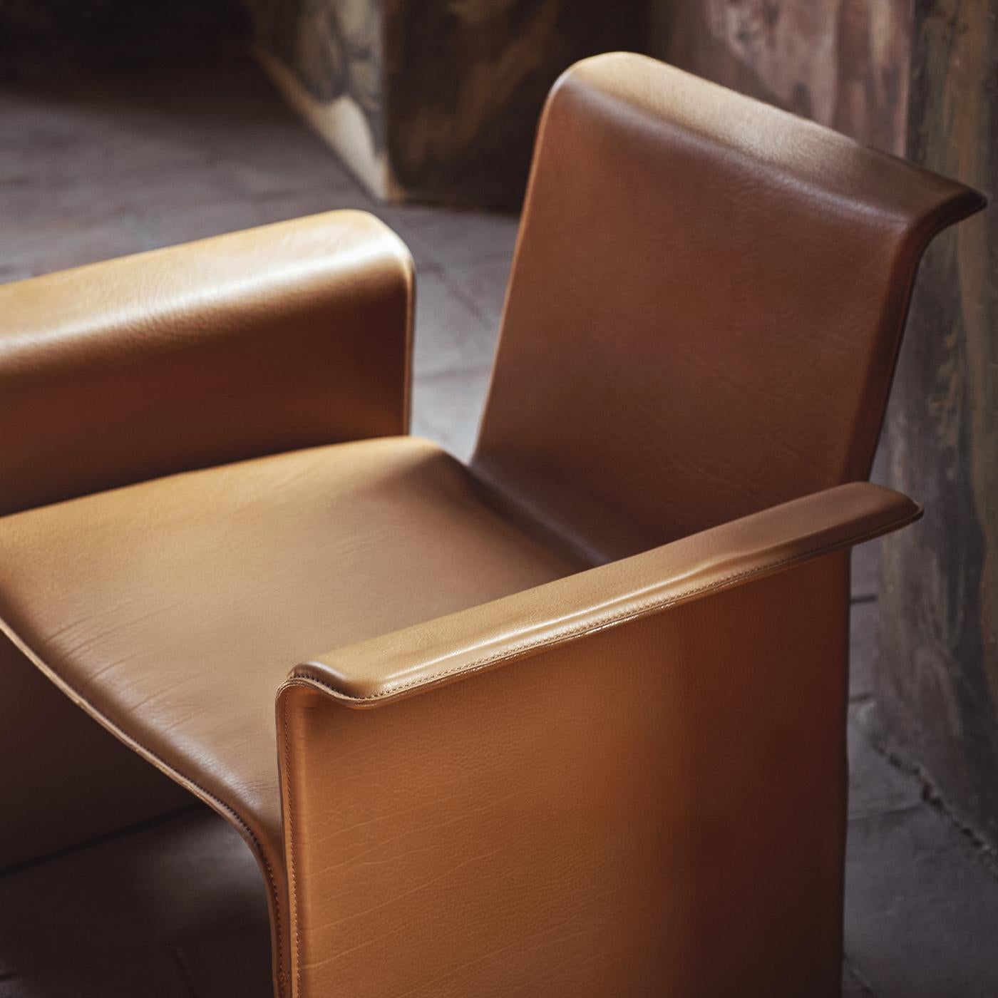 https://a.1stdibscdn.com/shell-brown-leather-armchair-studiopepe-by-exteta-for-sale-picture-2/f_17062/f_473136221761926374348/1760013924795_RMMMNY_0083_DSC_2253_a_master.jpg