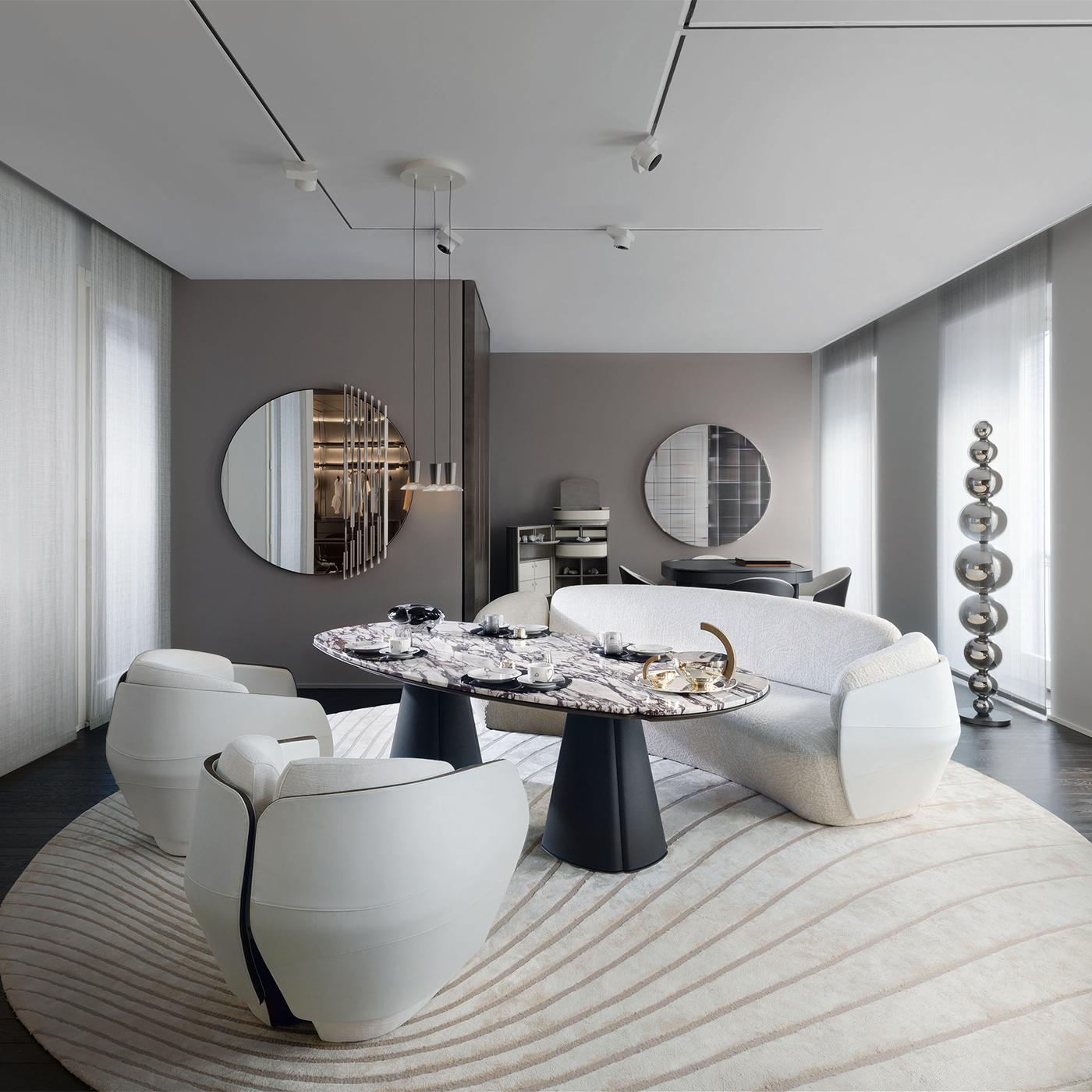 https://a.1stdibscdn.com/lorelei-white-fabric-and-leather-armchair-for-sale-picture-4/f_17062/f_479619221765533210086/1761321944359_RMMMNY_0070_Giorgetti_AM_SpigaThePlace_MDW_2025_002_HR_2__master.jpg