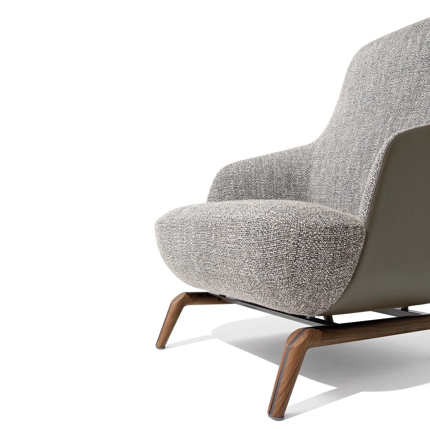 https://a.1stdibscdn.com/janet-gray-with-metal-base-and-canaletto-walnut-armchair-for-sale-picture-4/f_17062/f_479648521765550358639/1762268609506_RMMMNY_0000_Giorgetti_SL_Janet_armchair_005_HR_master.jpg