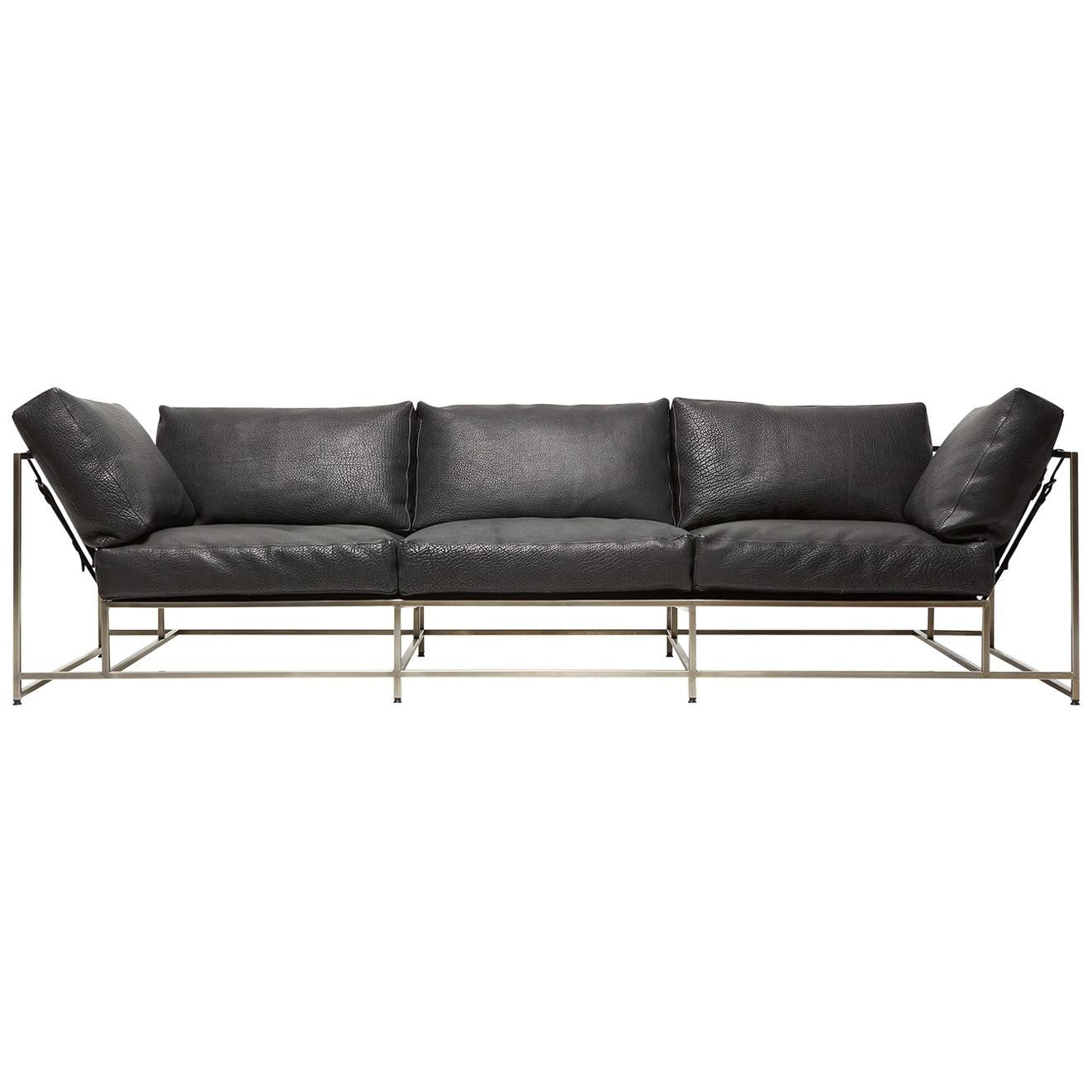 https://a.1stdibscdn.com/black-bison-leather-antique-nickel-sofa-for-sale/1121189/f_176673821579770802320/17667382_master.jpg