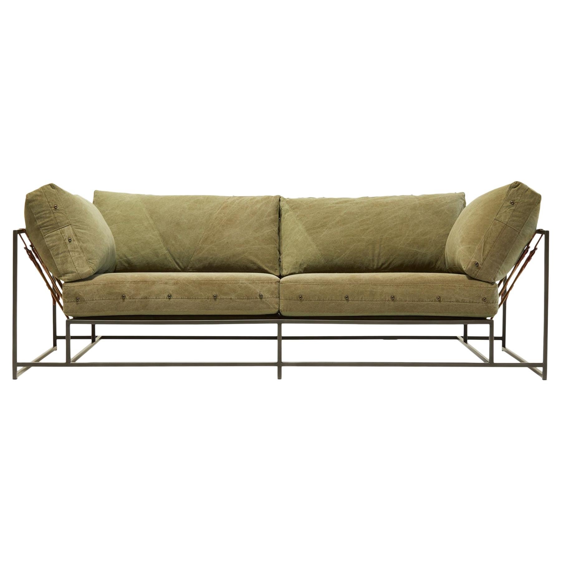 https://a.1stdibscdn.com/vintage-military-canvas-and-blackened-steel-v2-two-seat-sofa-for-sale/1121189/f_176685611579791685203/17668561_master.jpg
