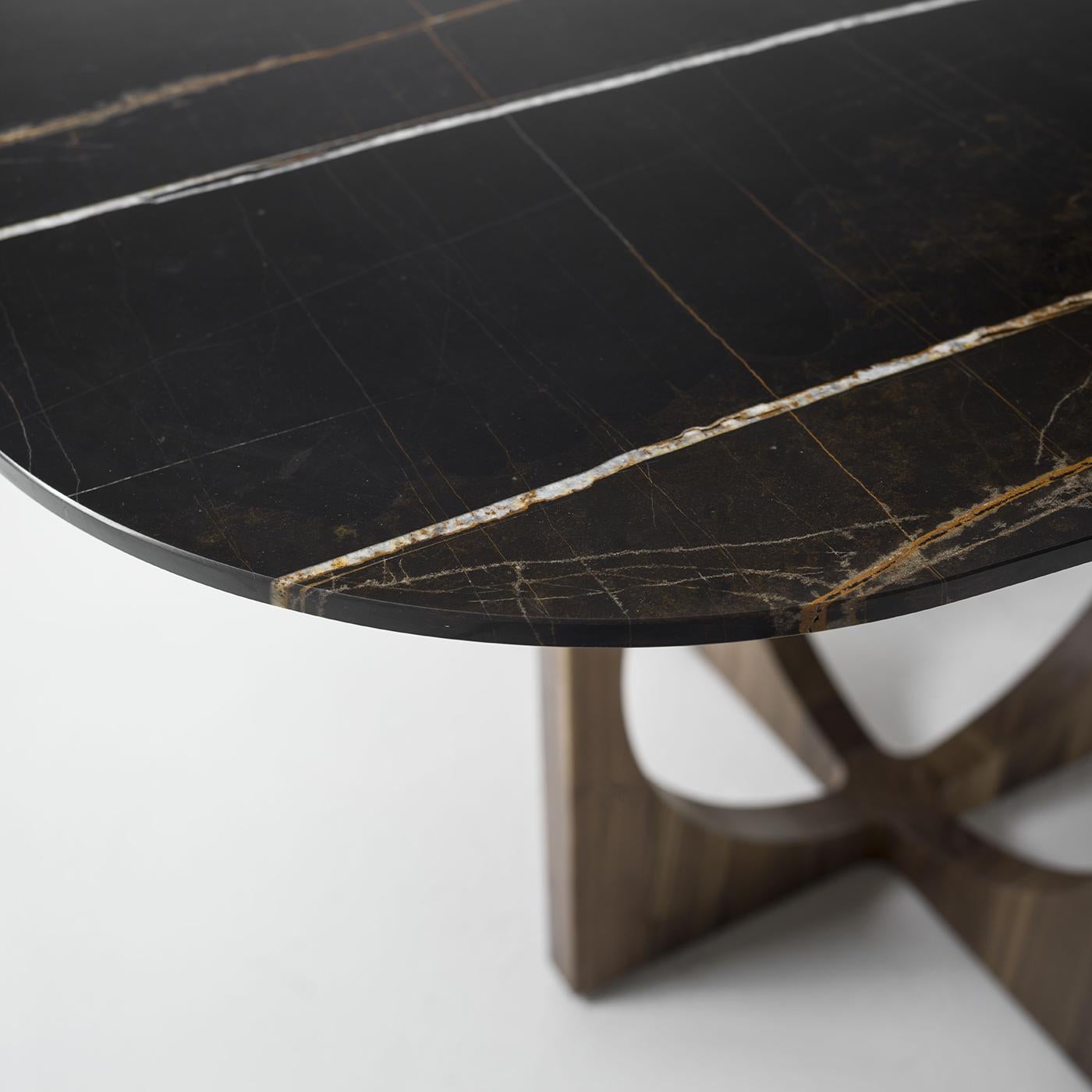 https://a.1stdibscdn.com/durame-vuoto-wood-base-with-sahara-noir-marble-top-dining-table-for-sale-picture-2/f_17062/f_487456521770734552458/1768230471203_ARTSNY_0013_B7039844_master.jpg