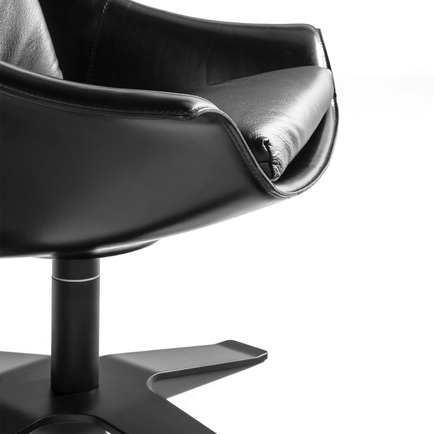 https://a.1stdibscdn.com/lullaby-black-leather-swivel-armchair-for-sale-picture-4/f_17062/f_495869821775726431013/1773394461695_RMSENY_0068_32A2898_master.jpg