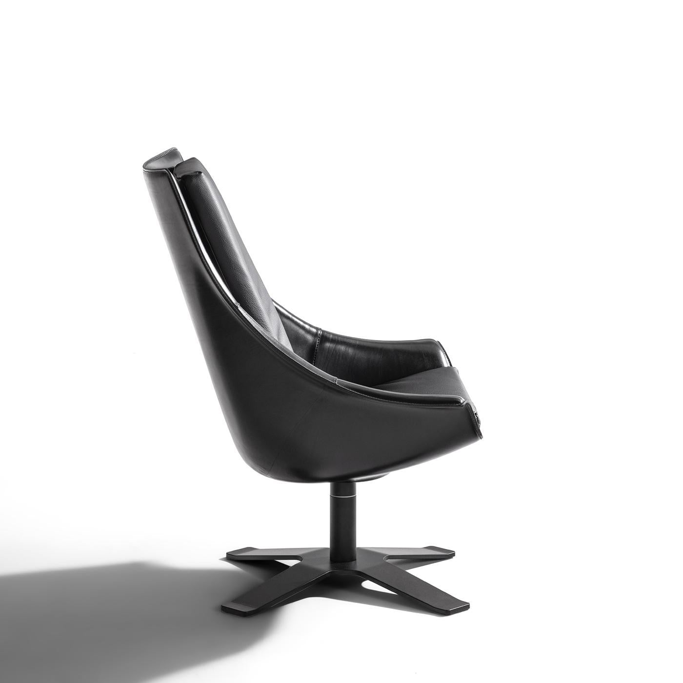 https://a.1stdibscdn.com/lullaby-black-leather-swivel-armchair-for-sale-picture-6/f_17062/f_495869821775726431807/1773394461707_RMSENY_0072_32A2891_master.jpg
