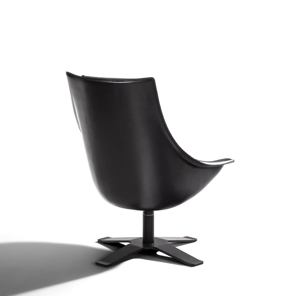 https://a.1stdibscdn.com/lullaby-black-leather-swivel-armchair-for-sale-picture-5/f_17062/f_495869821775726430889/1773394461716_RMSENY_0073_32A2890_master.jpg