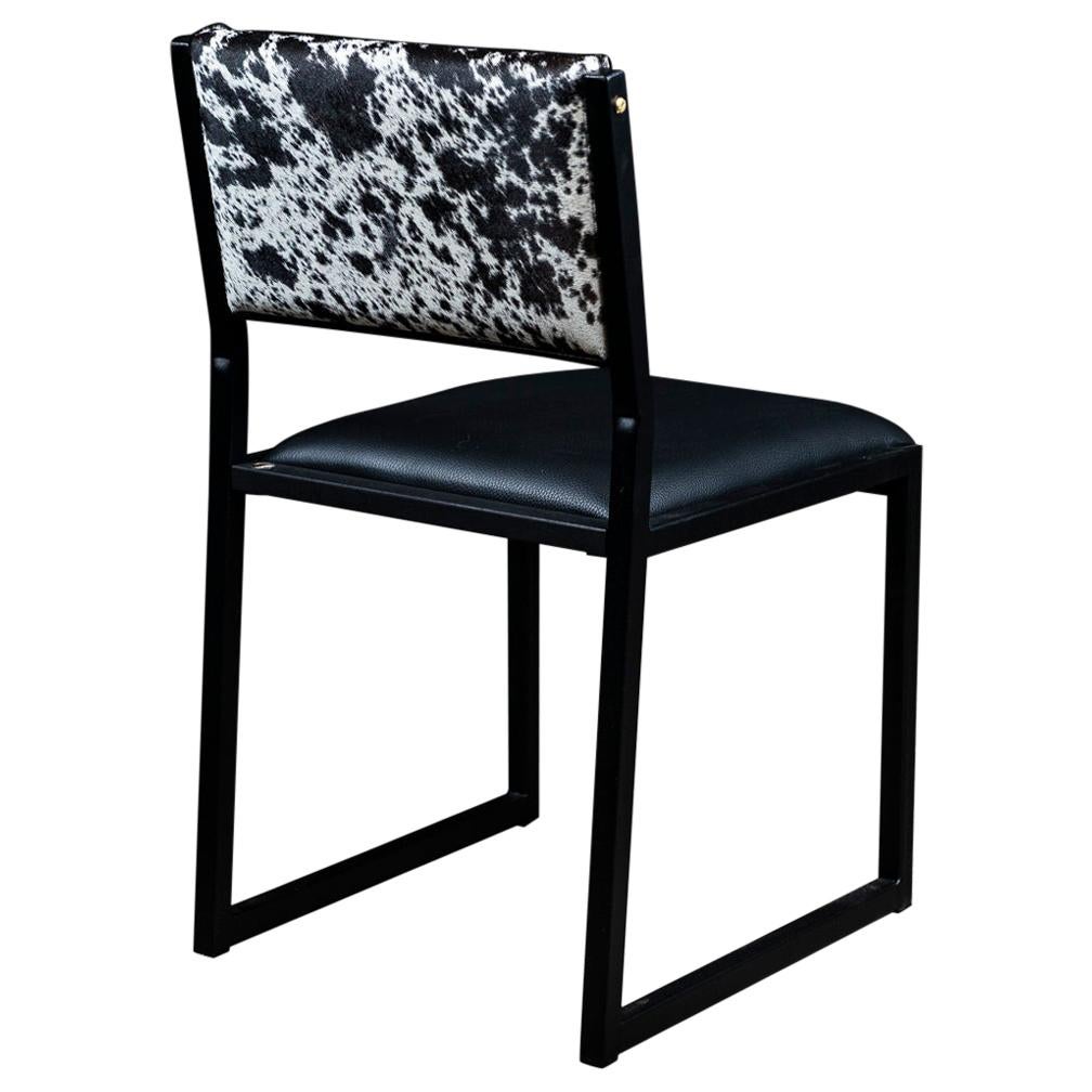 https://a.1stdibscdn.com/shaker-modern-chair-by-ambrozia-salt-pepper-cow-hide-black-leather-steel-for-sale/1121189/f_177801121580536394719/17780112_master.jpg