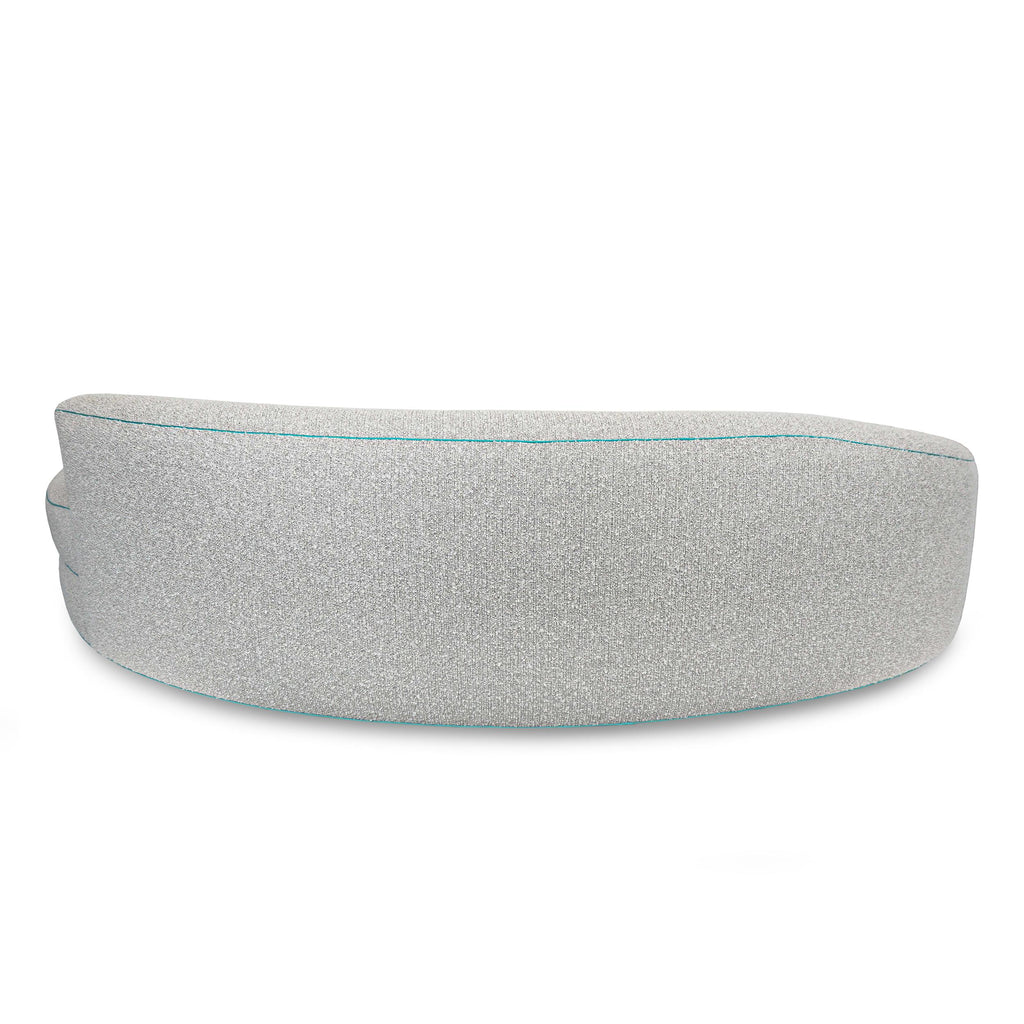 https://a.1stdibscdn.com/boucle-curved-sofa-with-turquoise-accents-for-sale-picture-13/f_21233/1622750929318/17_master.jpg